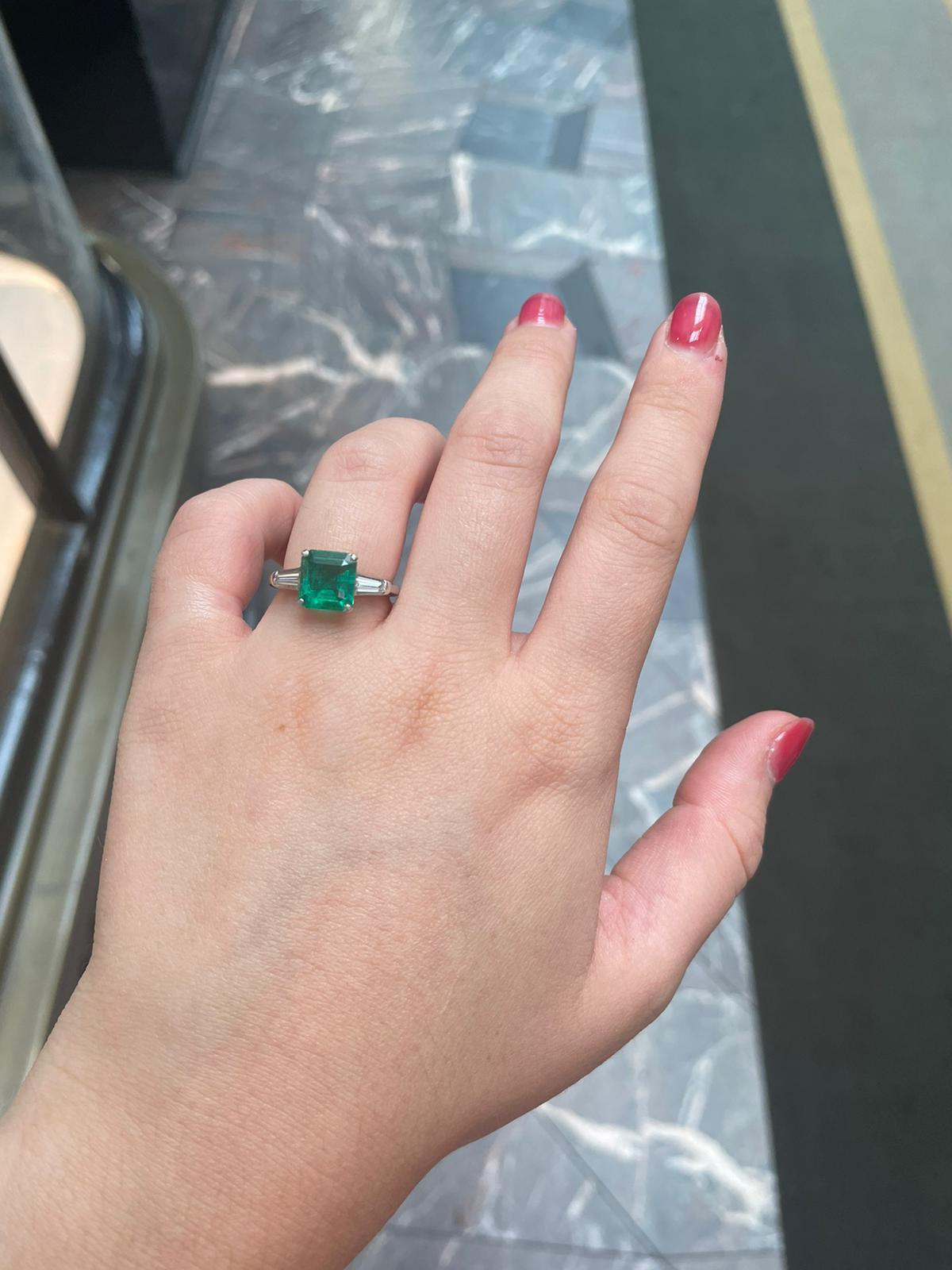 1.70 Carat Emerald and Diamond Three Stone Platinum Engagement Ring In Good Condition In London, GB