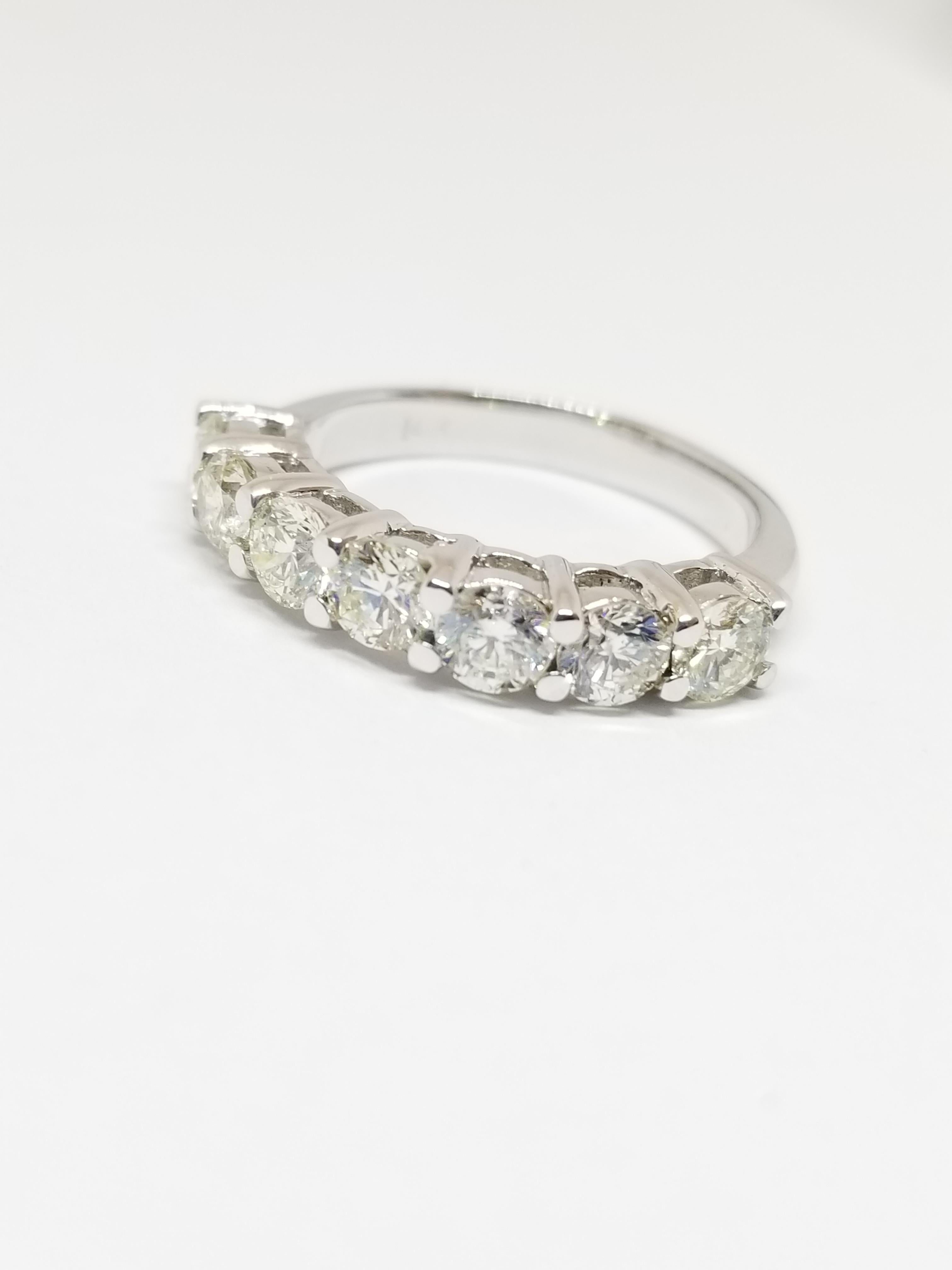 Beautiful 1.70 Carats Diamond half Band has 7 Pieces of very shiny H-I Color VS-SI Clarity diamonds.

Ring Size 7