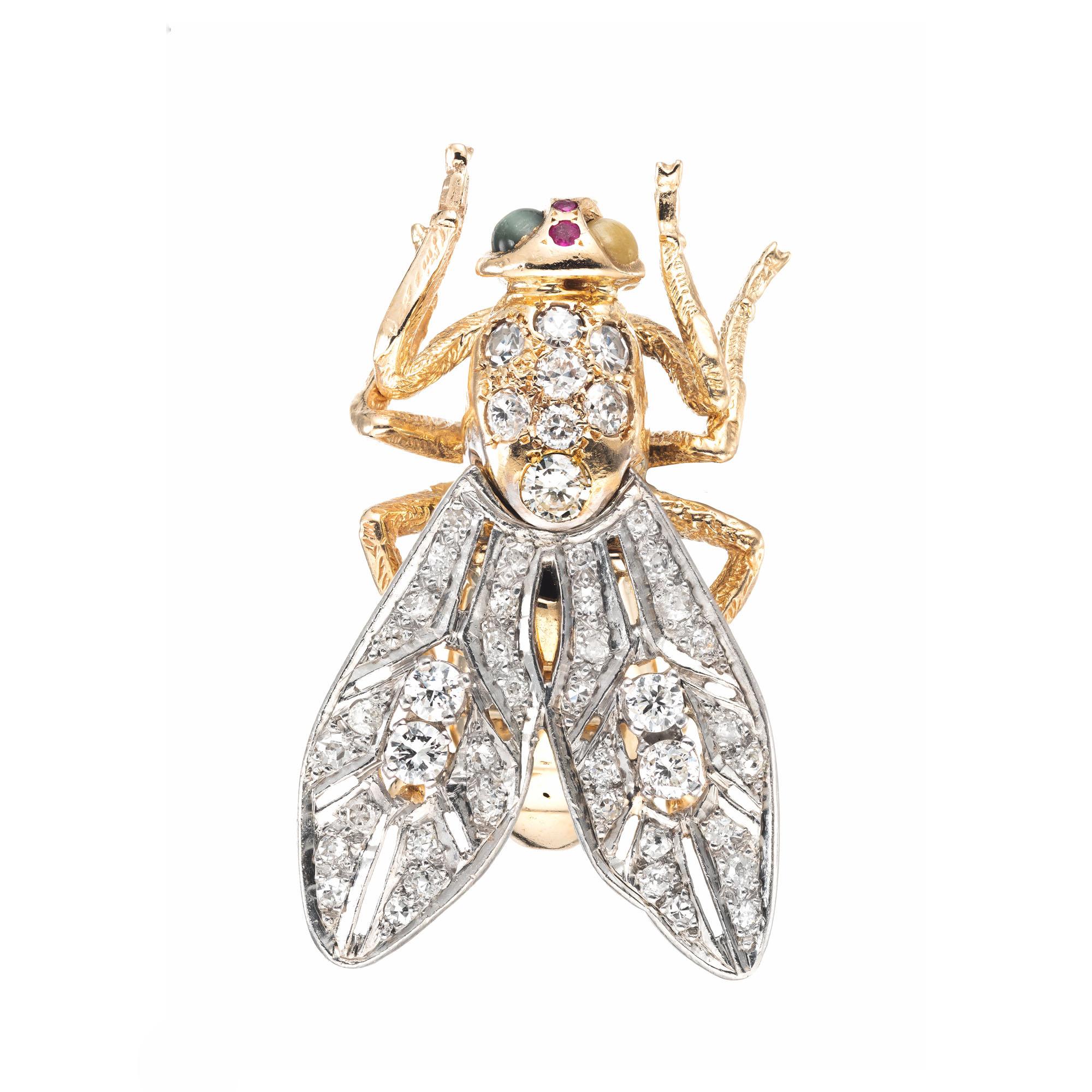 Mid-Century Three-dimensional large fly brooch in 14k yellow and white gold with movable wings set with 1.70 carats of mixed diamonds, ruby accents and quartz cats and tiger eyes.

4 round brilliant cut diamonds, G-H VS2 approx. .40cts
36 old Euro