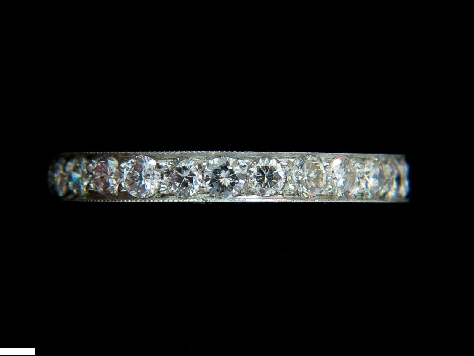 The classic Pave eternity 

Size: 6.5

2.8mm thick


Diamonds: 1.70ct. 

Rounds & full cuts 
F-color 

 Si-1 clarity

14kt white gold.

I am not able to resize.

3.3 grams.

$4800 Appraisal report will accompany
