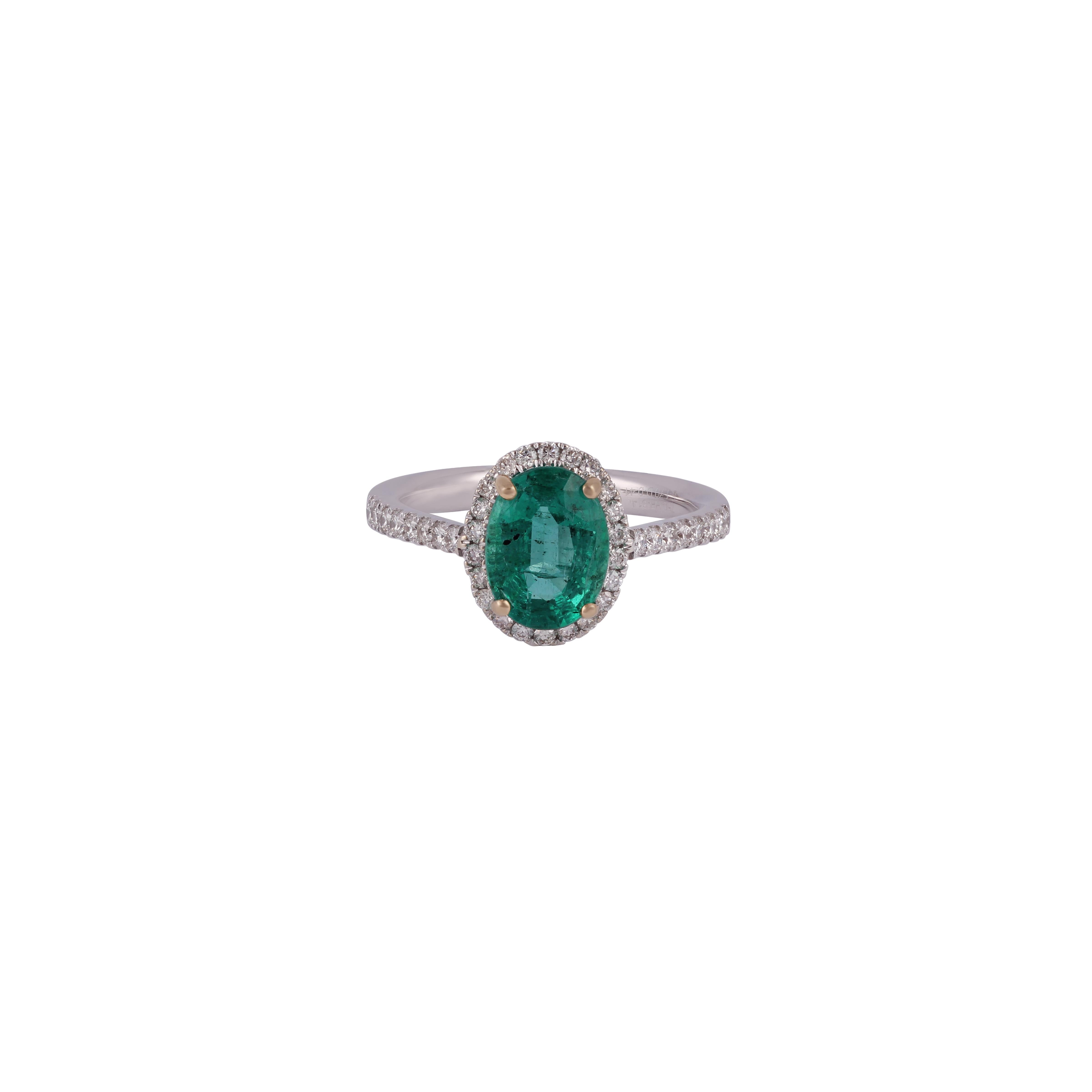 This is an elegant emerald & diamond ring studded in 18k white gold with 1 piece of oval shaped zambian emerald weight 1.70 carat which is surrounded by 38 pieces of round shaped diamonds weight 0.41 carat, this entire ring studded in 18k white gold