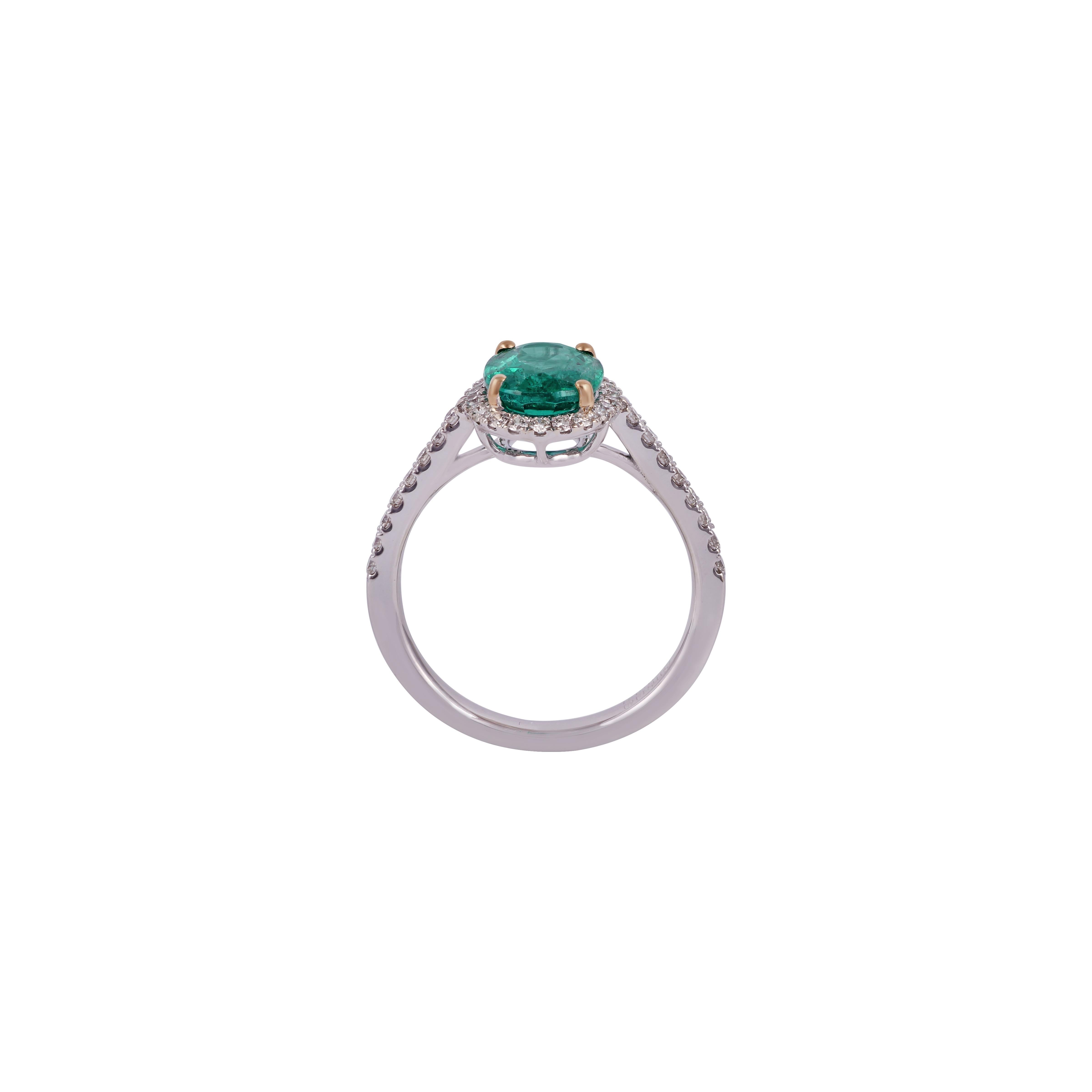 Modern 1.70 Carat Emerald & Diamond Ring Studded in 18K White Gold