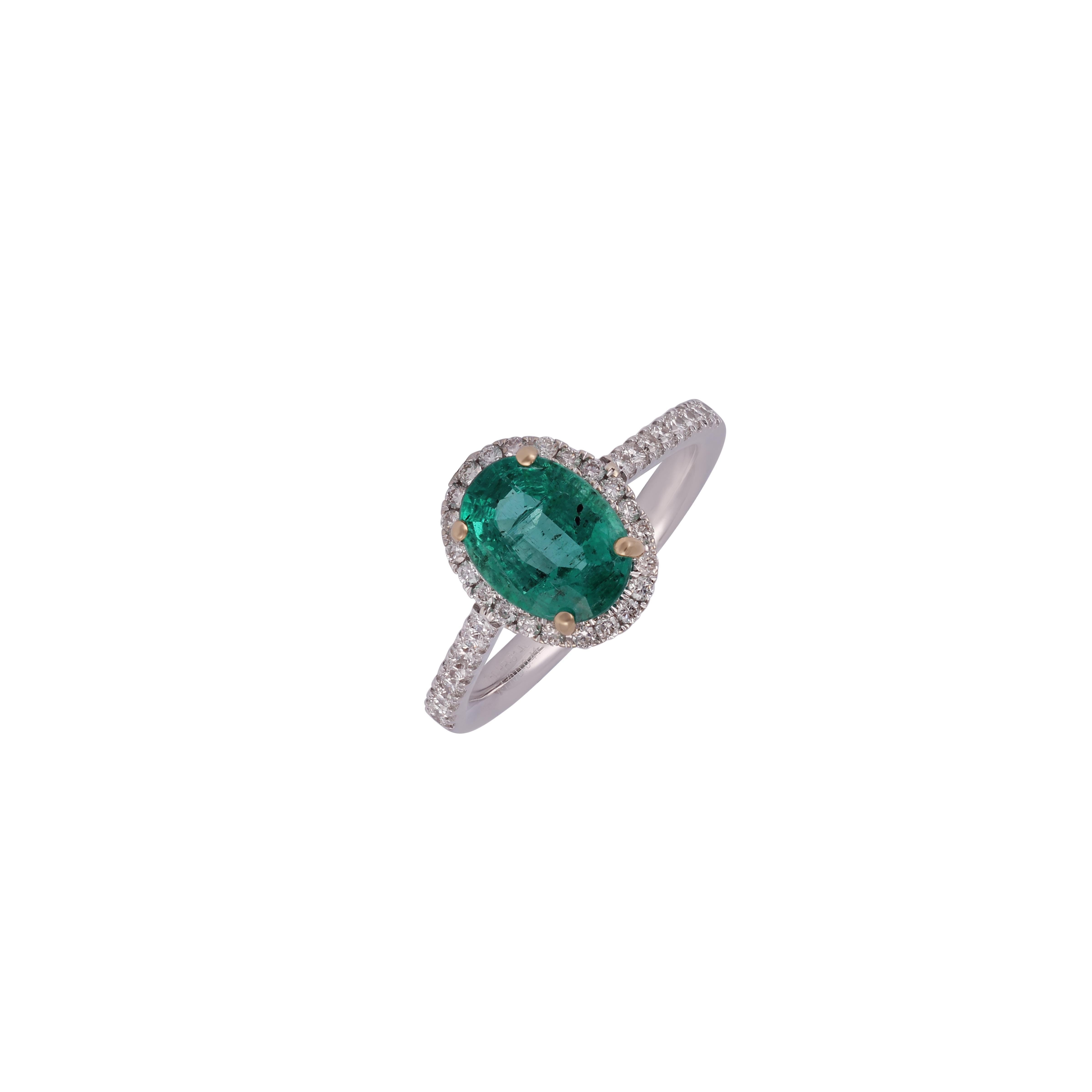 Oval Cut 1.70 Carat Emerald & Diamond Ring Studded in 18K White Gold