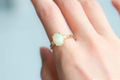 1.70 Carat Ethiopian Opal Oval Cab Diamond Accents 10K Yellow Gold Ring