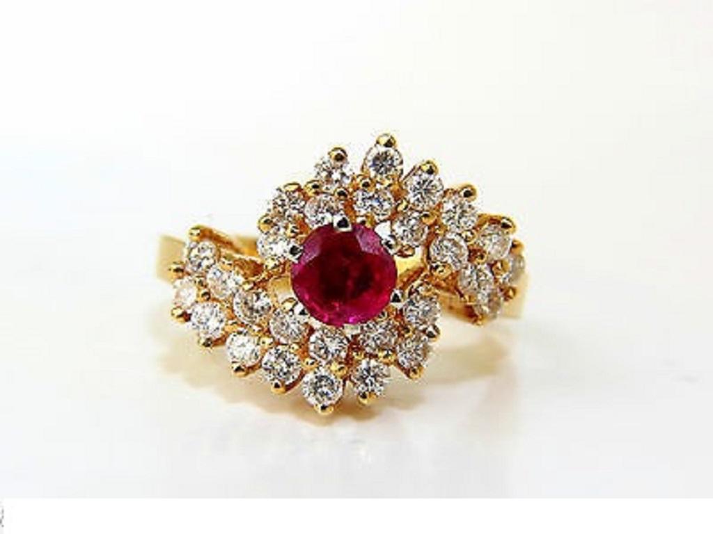 .70ct. Natural Ruby
Round, Fully faceted

Excellent transparency 

Clean clarity

A+ Pigeon Blood tone



1.25ct. Diamonds: 

Rounds, full cuts

H-color, Vs-2 clarity.



14kt. yellow gold.

New, yet vintage cocktail motif

5.7grams.

13.4mm