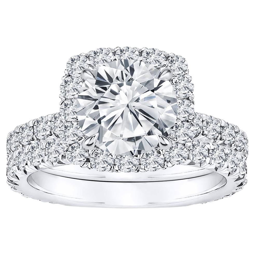 For Sale:  1.70 ct. tw. Halo Design Diamond Wedding Set