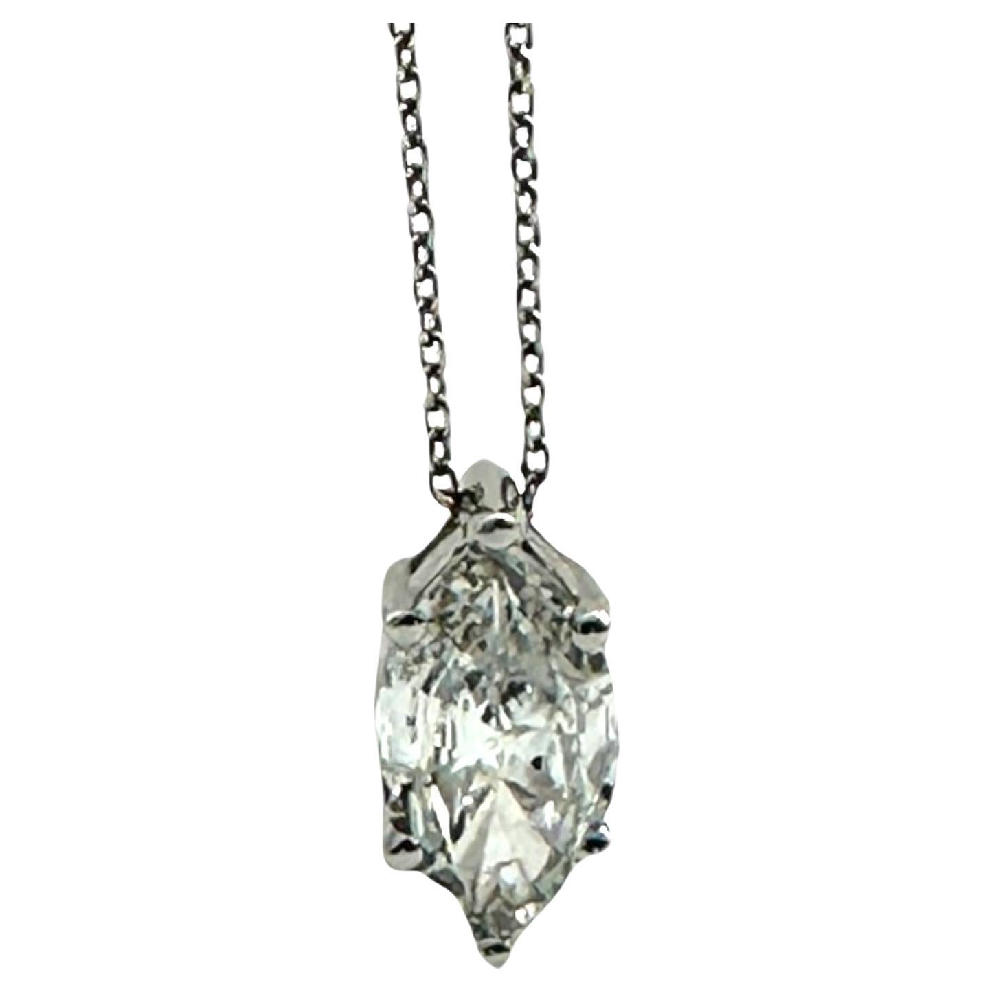 This 1.70-carat marquise cut natural diamond solitaire pendant in 14K white gold is a timeless and elegant piece. Measuring 12.5 x 6.7 x 3.5 mm, its SI2 clarity and 4 color make it a high-quality, sparkling addition to any jewelry collection.