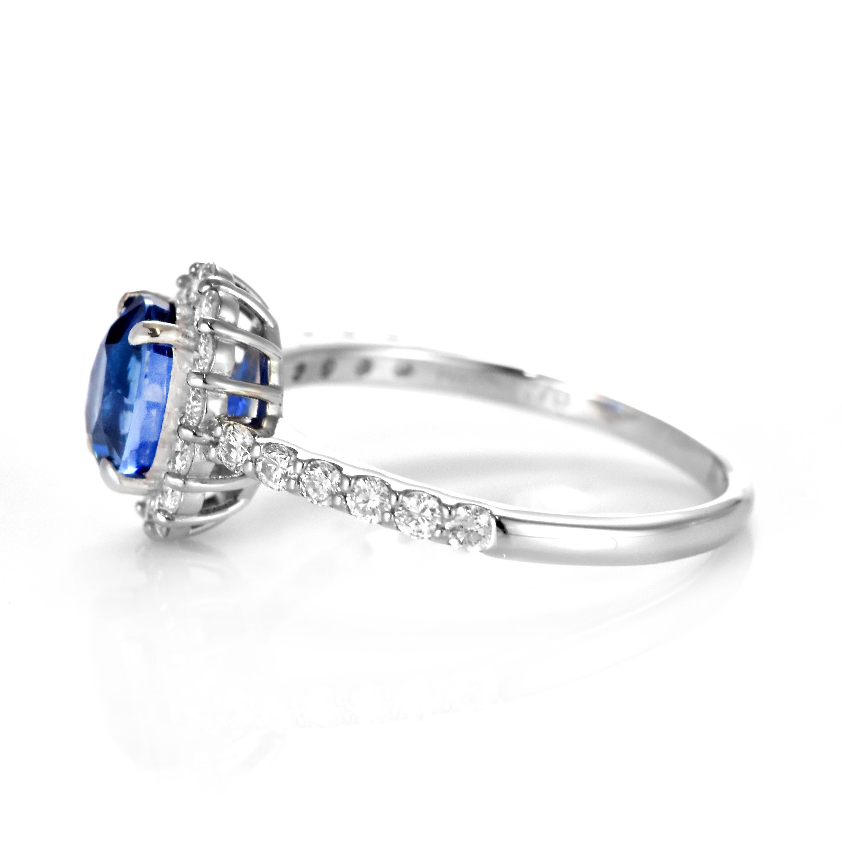 Oval Cut 1.70 Carat Natural Sapphire and Diamond Ring Made in Platinum For Sale
