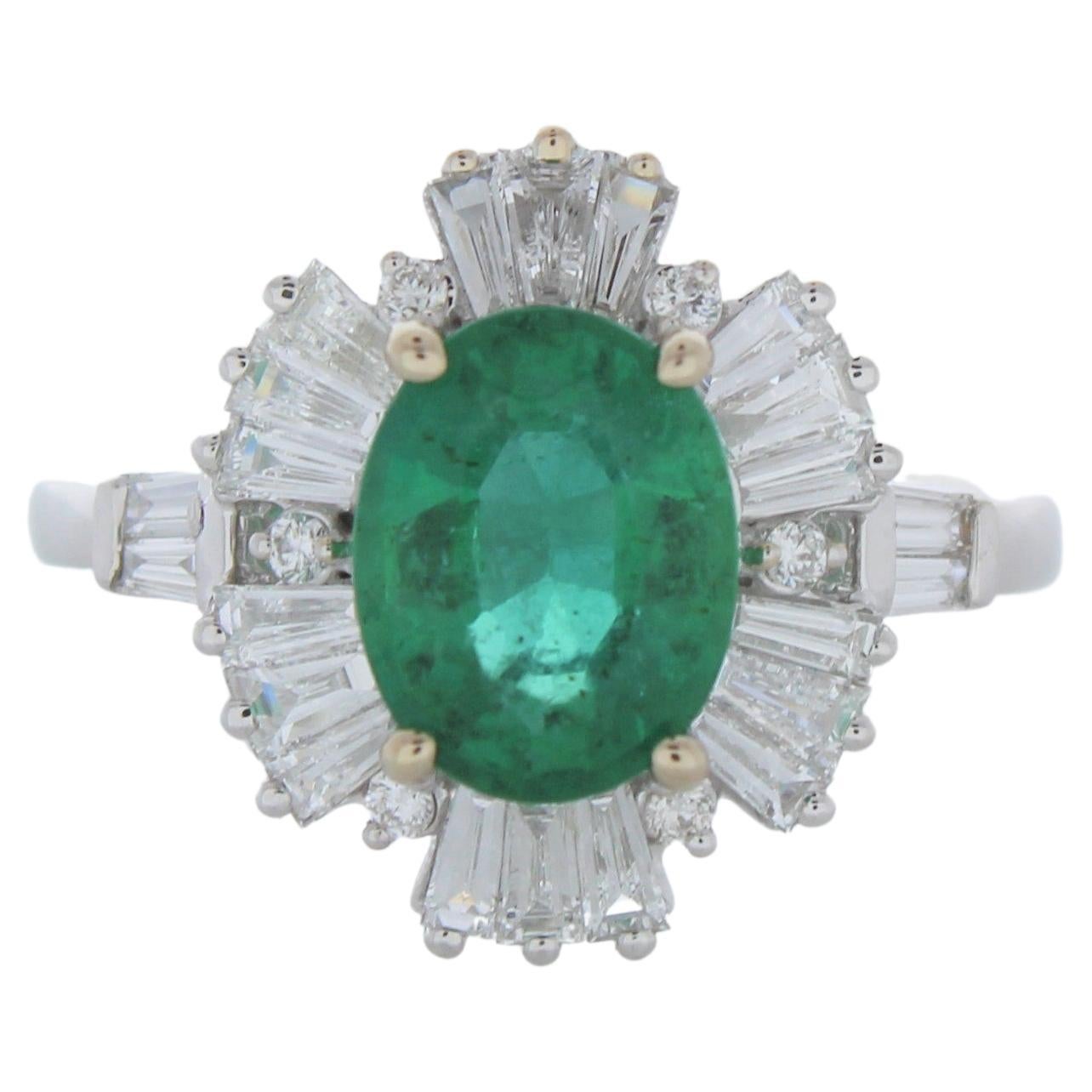 1.70 Carat Oval Emerald and Diamond Ring in 18K White Gold For Sale