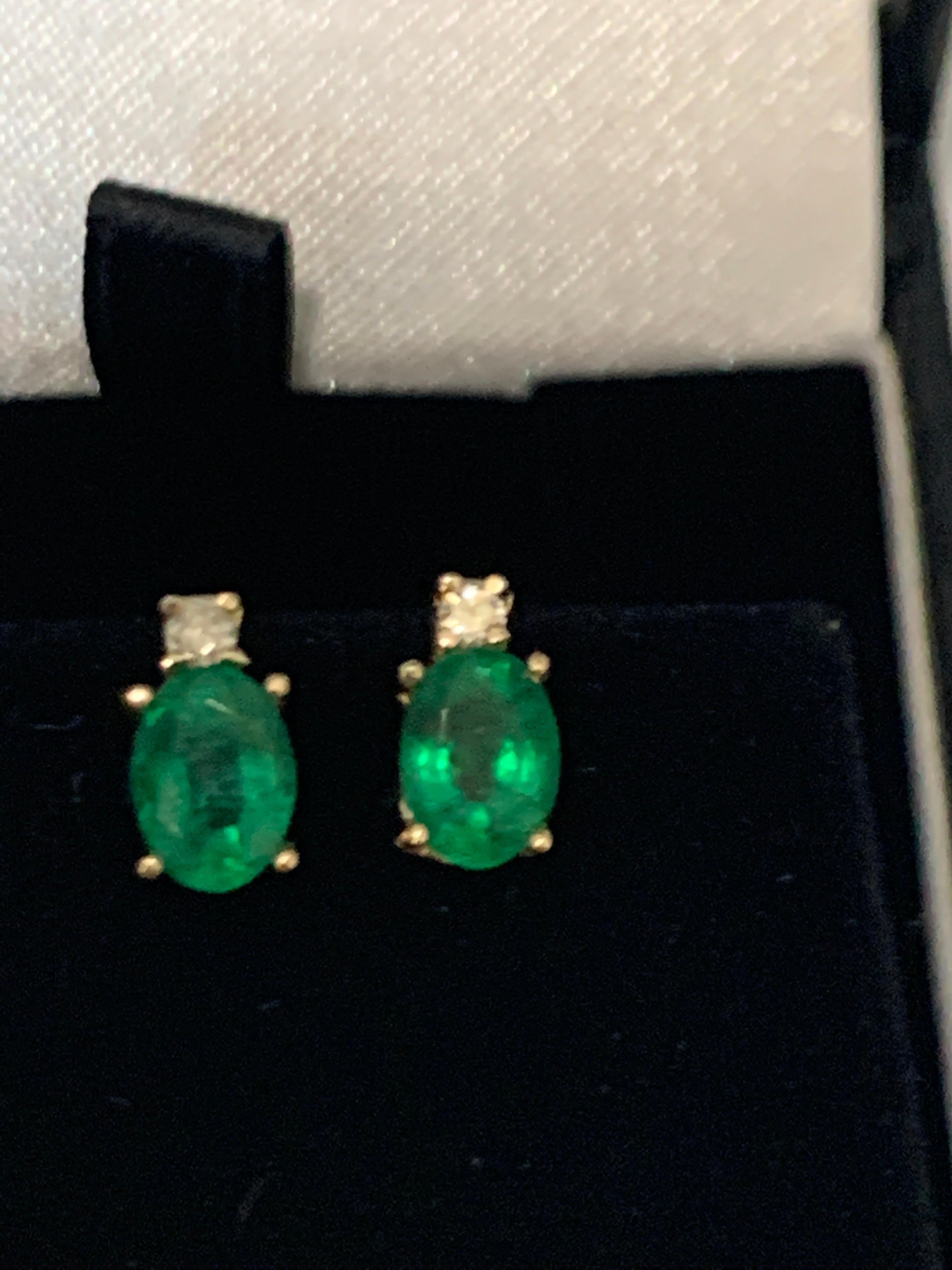 Oval Cut 1.70 Carat Oval Natural Emerald and Diamond Stud Post Earrings 14 Karat Gold
