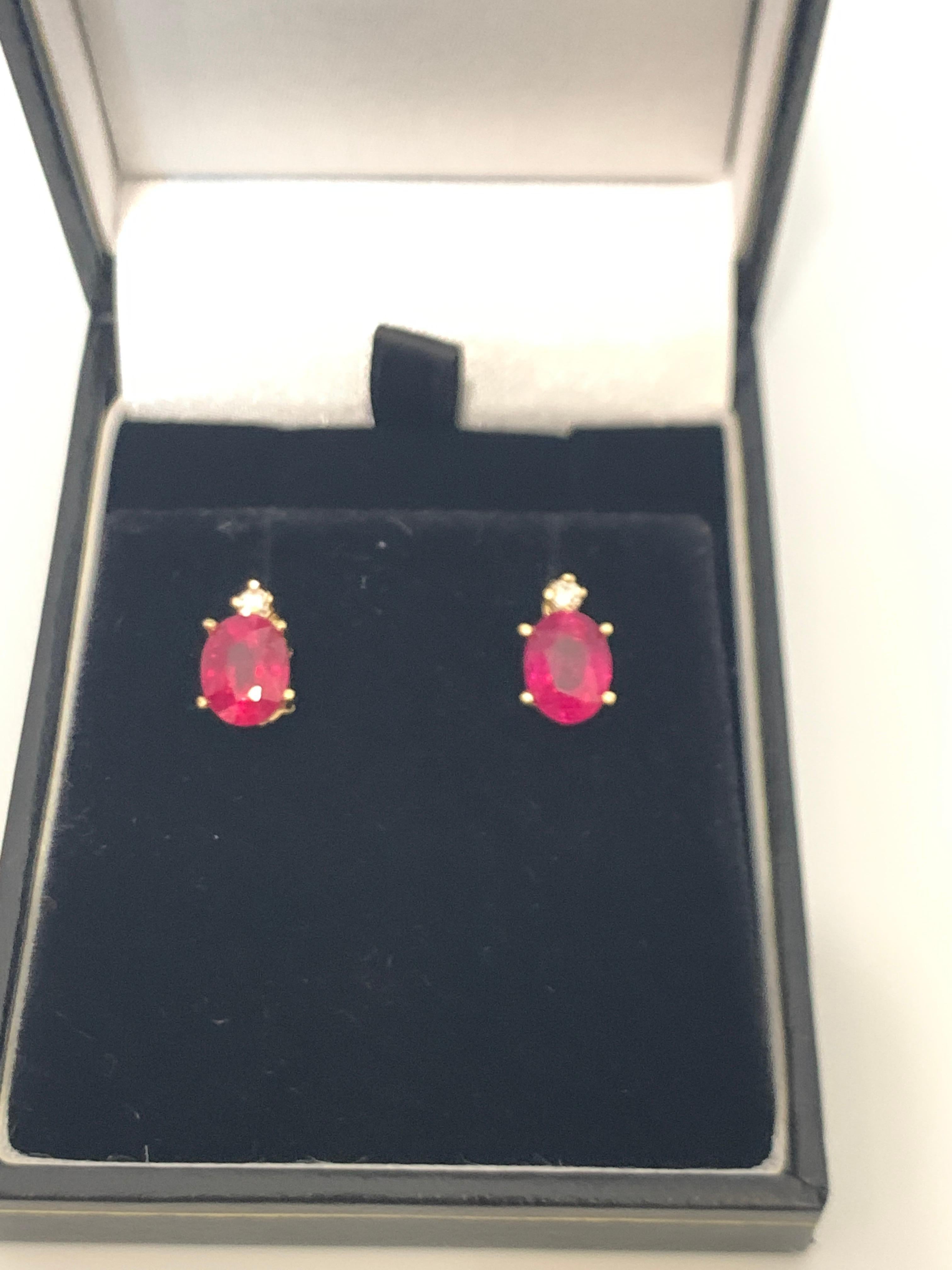 Oval Cut 1.70 Carat Oval Natural Ruby and Diamond Stud Post Earrings 14 Karat Yellow Gold