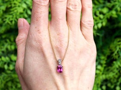 1.70 Carat Pink Sapphire 0.19 Carat Diamond 18k Yellow and White Gold Pendant