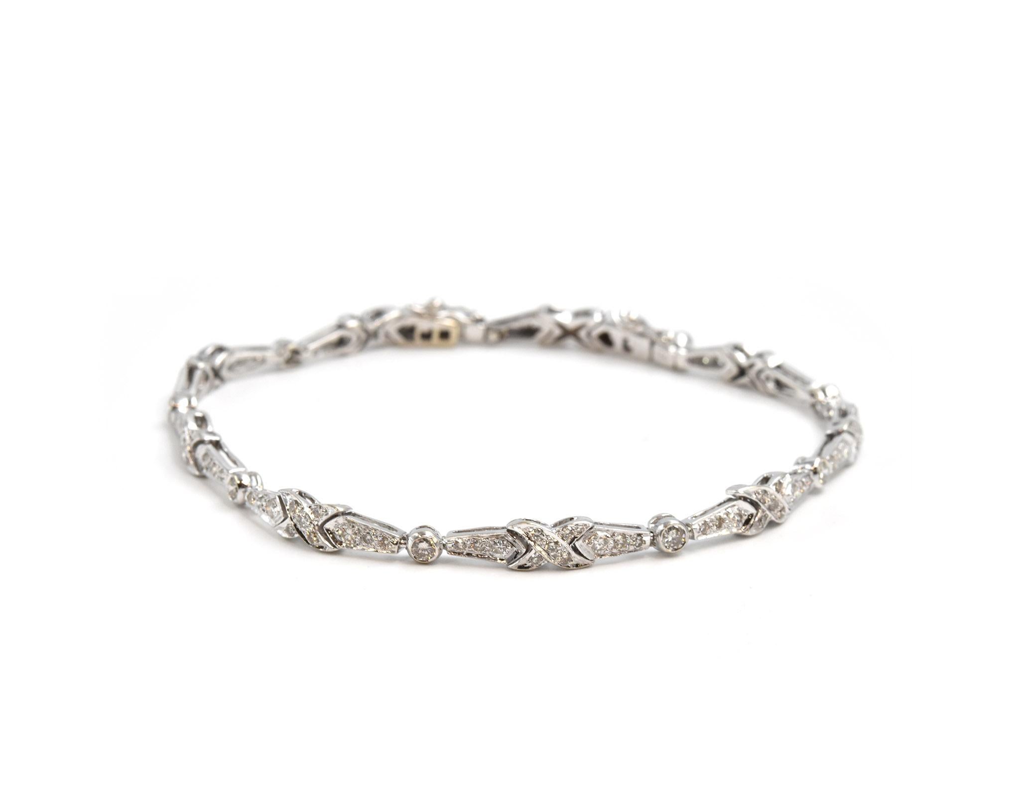 Designer: custom design
Material: 18k white gold
Diamonds: 137 round brilliant cut = 1.76 carat total weight
Color: H
Clarity: SI1
Dimensions: bracelet is 7 1/2-inch long
Weight: 11.32 grams
