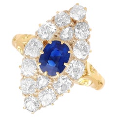1.70 Carat Sapphire 3.92 Carat Diamond 15k Yellow Gold Cluster Ring Circa 1930