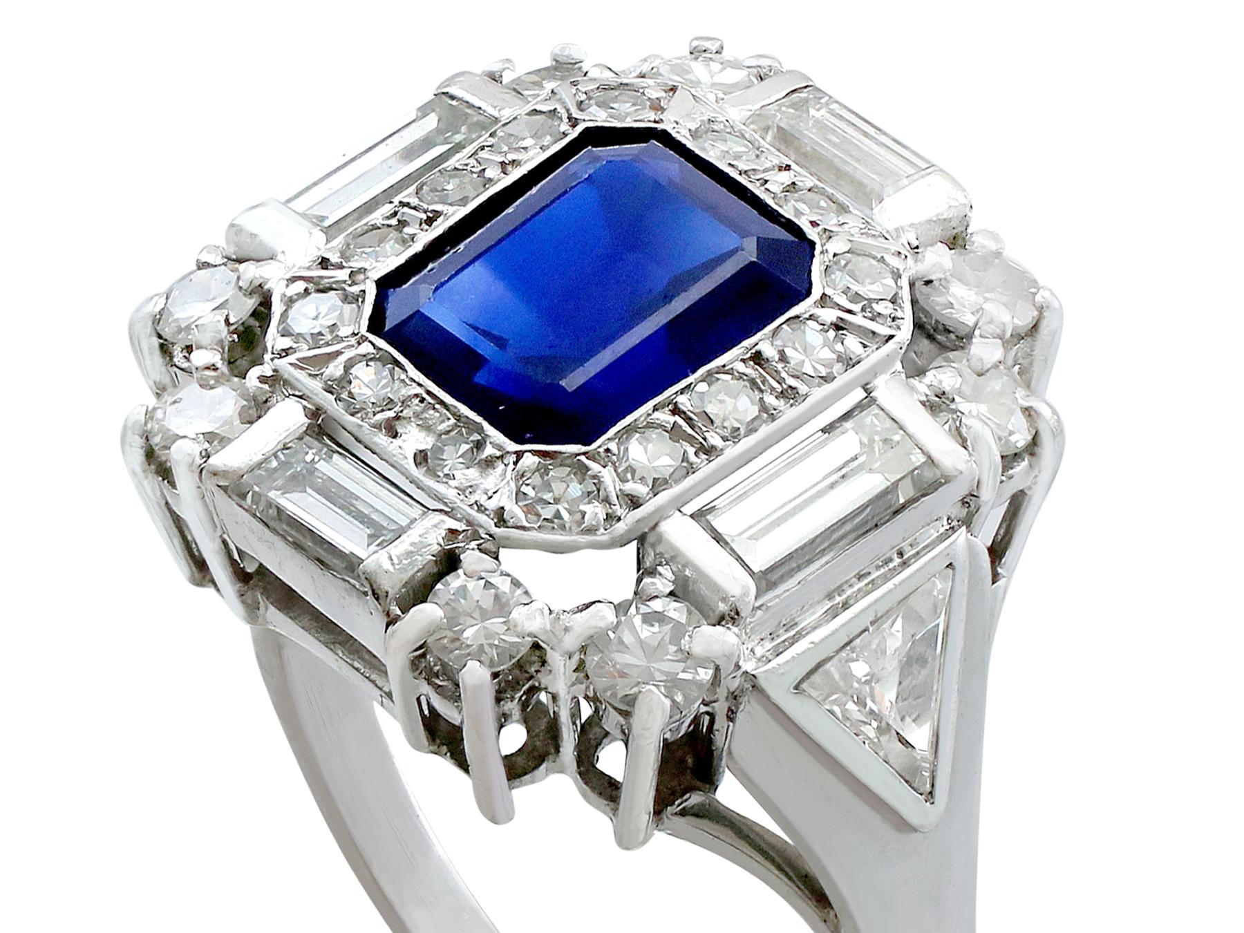 A stunning vintage 1950's 1.70 carat basaltic sapphire and 1.76 carat diamond, platinum cocktail ring; part of our diverse gemstone jewellery and estate jewelry collections.

This stunning, fine and impressive vintage sapphire ring has been crafted