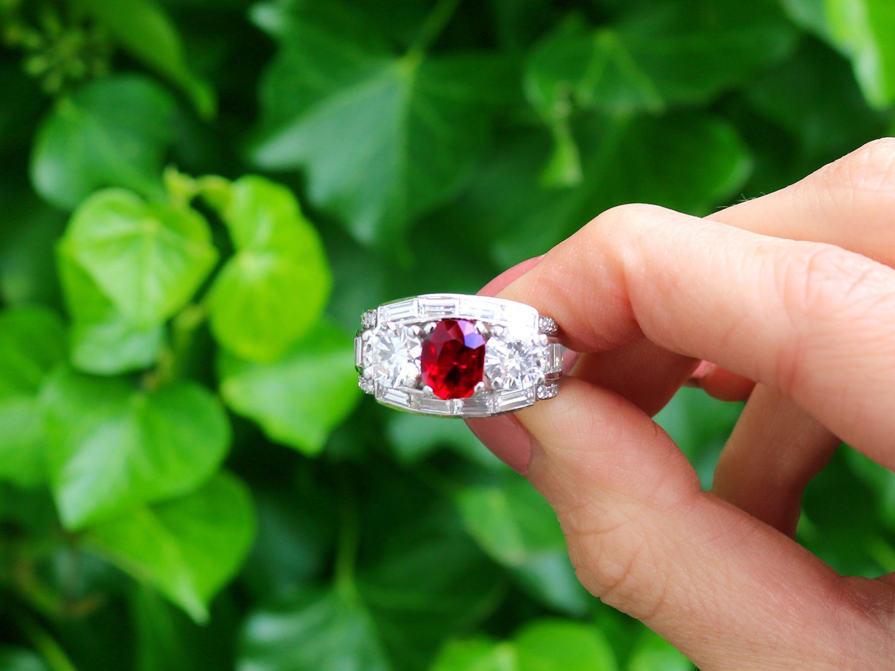 A stunning, fine and impressive vintage 1.70 carat Thai ruby and 3.02 carat diamond, platinum cocktail ring; part of our diverse vintage jewelry and collections.

This stunning vintage ruby ring has been crafted in platinum.

The substantial,