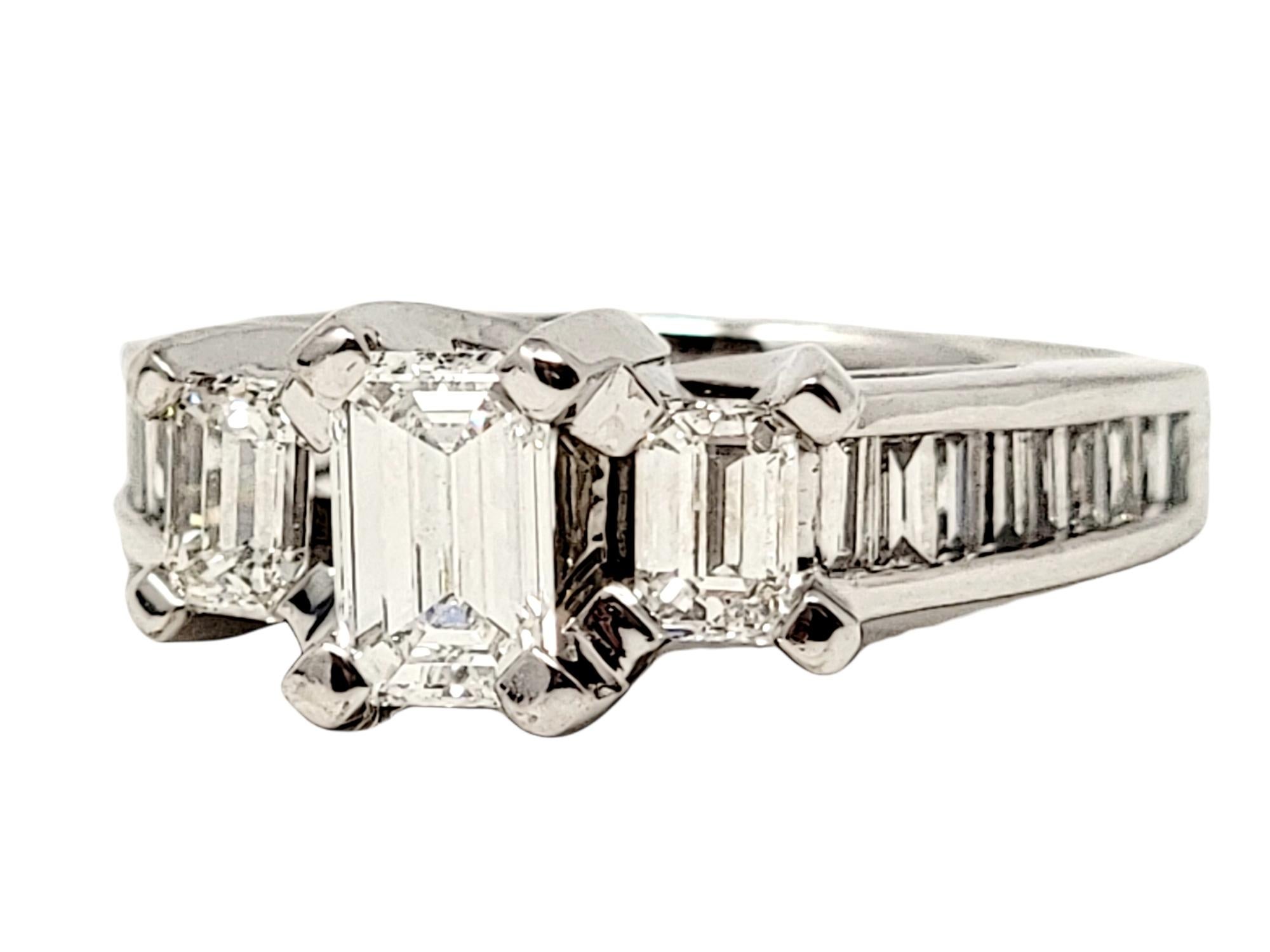 Contemporary 1.70 Carat Total Emerald Cut Diamond Three Stone Engagement Ring 14 Karat Gold For Sale