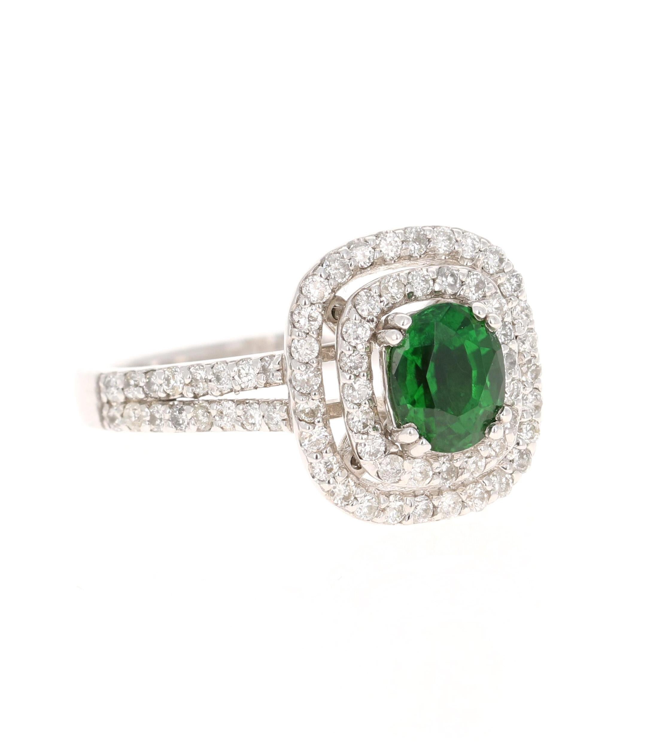 This ring has an Oval Cut Tsavorite which weighs 0.99 carats and is surrounded by a double halo of 81 Round Cut Diamonds that weighs 0.71 carats. The total carat weight of the ring is 1.70 carats. The clarity and color of the diamonds are SI-F.

The
