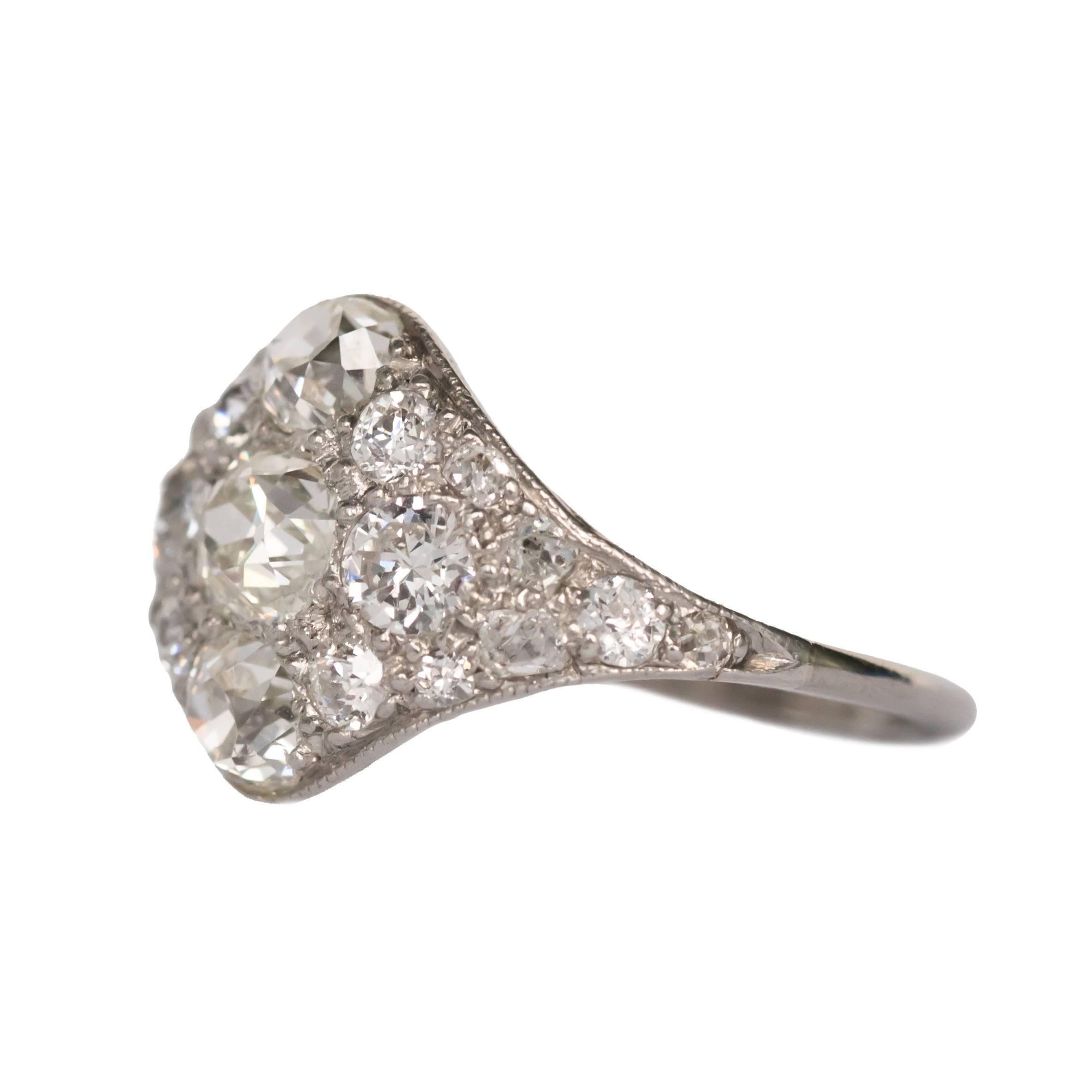 Item Details: 
Ring Size: 7.25
Metal Type: Platinum
Weight: 3.9 grams

Center Diamond Details:
Shape: Old Mine Brilliant
Carat Weight: .70 carat
Color: G
Clarity: VS1

Side Stone Details: 
Shape: Old Mine Cushion
Total Carat Weight: 1.00 carat,