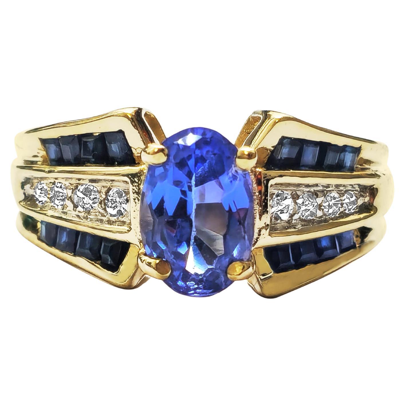 1.70 carats Blue Sapphire & Diamond Ring with Tanzanite Center in 14k Gold For Sale