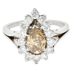 1.70 Carats Diamond 
Fancy Colored Diamond 14 Karat White Gold Pear Ring