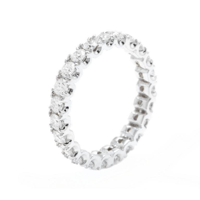 1.70 Carats Natural Diamond 14K Solid White Gold Eternity Ring

Total Natural Round Cut Diamonds Weight: Approx. 1.70 Carats (color G-H / Clarity SI1-SI2)

The width of the ring is: 3.2mm

Ring size: 7 (not sizable)

Item total weight: 2.8