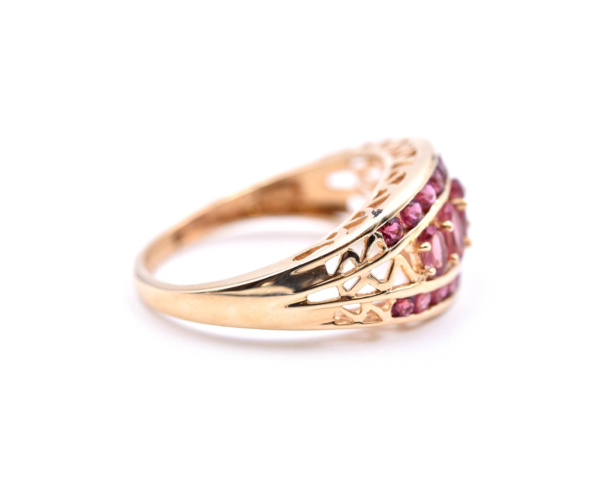 Designer: custom design
Material: 14k yellow gold 
Pink Tourmaline: 1.70
Ring Size: 9 3/4 (please allow two additional shipping days for sizing requests) 
Weight: 14.34 grams
