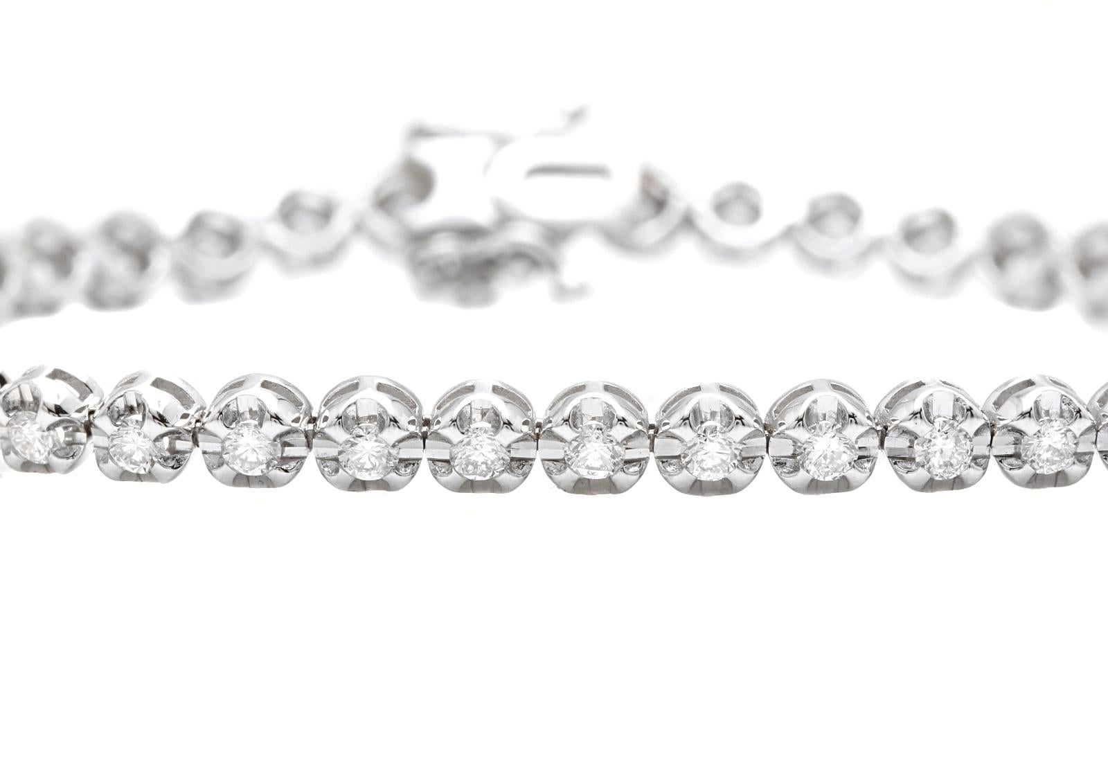 1.70 Carats Stunning Natural Diamond 14K Solid White Gold Bracelet 

Suggested Replacement Value: Approx. $5,500.00

STAMPED: 14K

Total Natural Round Diamonds Weight: Approx. 1.80 Carats (color G-H / Clarity SI1-SI2)

Bangle Wrist Size is:  7