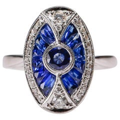 1.70 Ct Blue Sapphire 0.26 Carat Diamond Pave 18 Karat White Gold Oval Ring