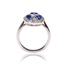 1.70 Ct Blue Sapphire 0.26 Carat Diamond Pave 18 Karat White Gold Oval Ring