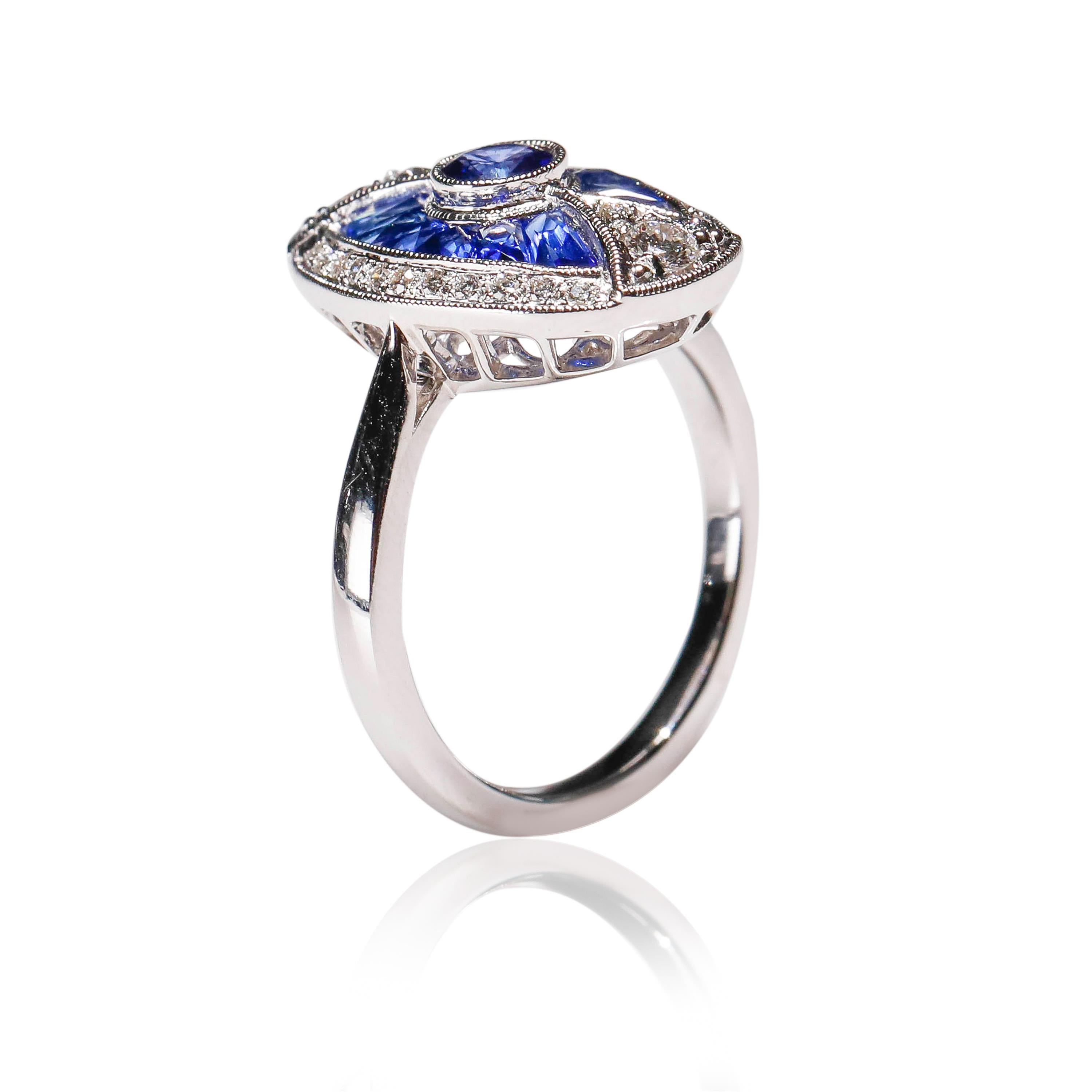 Art Deco 1.70 Ct Blue Sapphire 0.26 Carat Diamond Pave 18 Karat White Gold Oval Ring For Sale