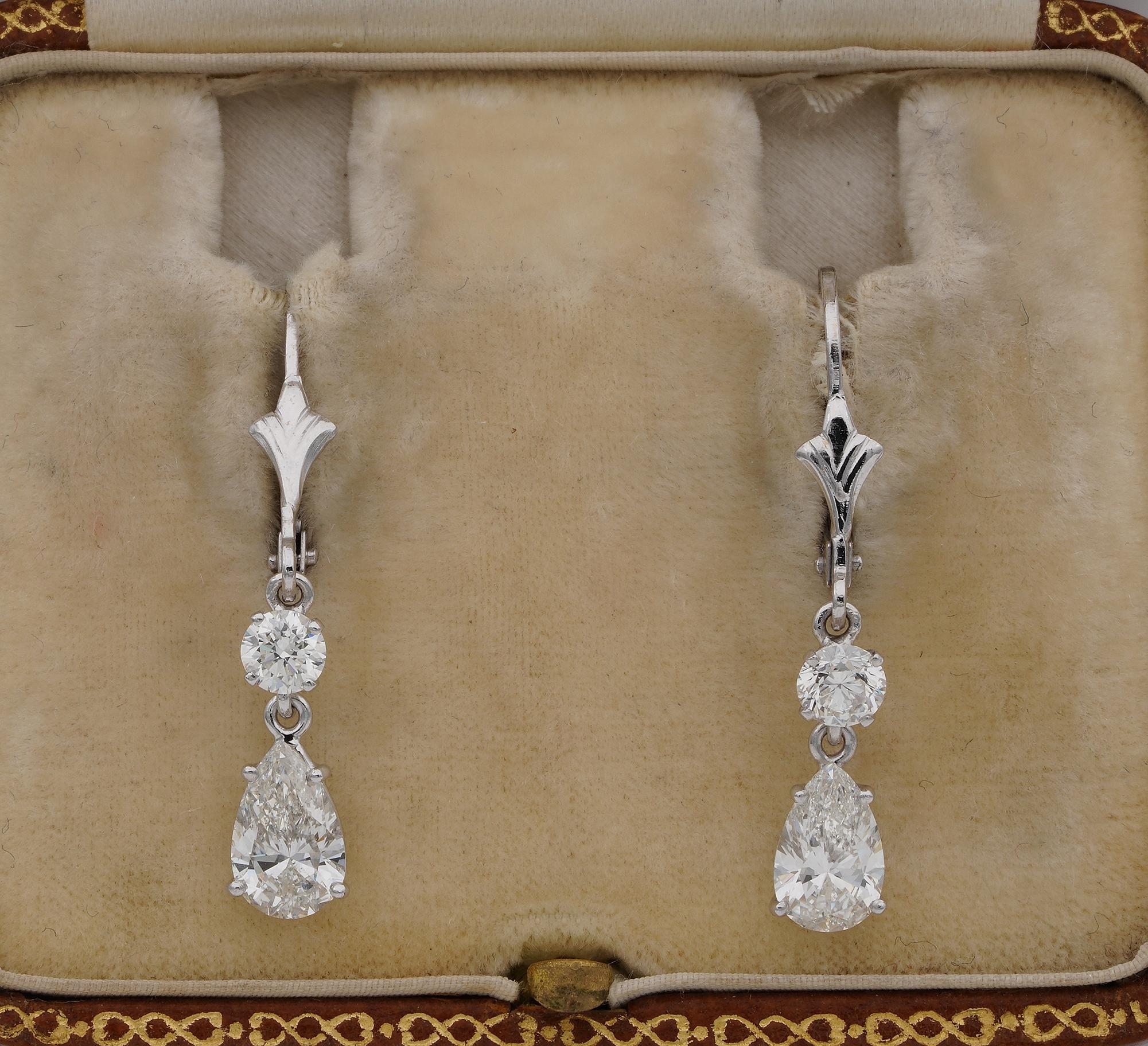 Glowing Sparkle!
Ravishing Diamond drop earrings pre 1980 – hand crafted of solid 18 Kt white gold with minimal amount of gold metal giving special lightness to the immense Diamond sparkle and gorgeous swing effect at any movement
Fleur de lis top