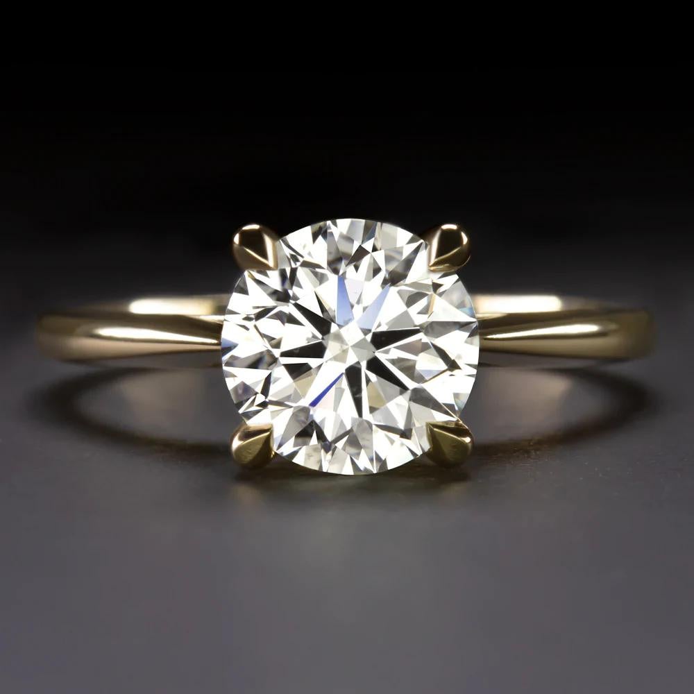 Fantastic timeless solitaire ring features a stunning 1.70 carat natural diamond set in an elegant and sophisticated way.
Exceptionally well cut, the diamond is GIA certified and displays phenomenal brilliance.
The diamond is beautifully white and