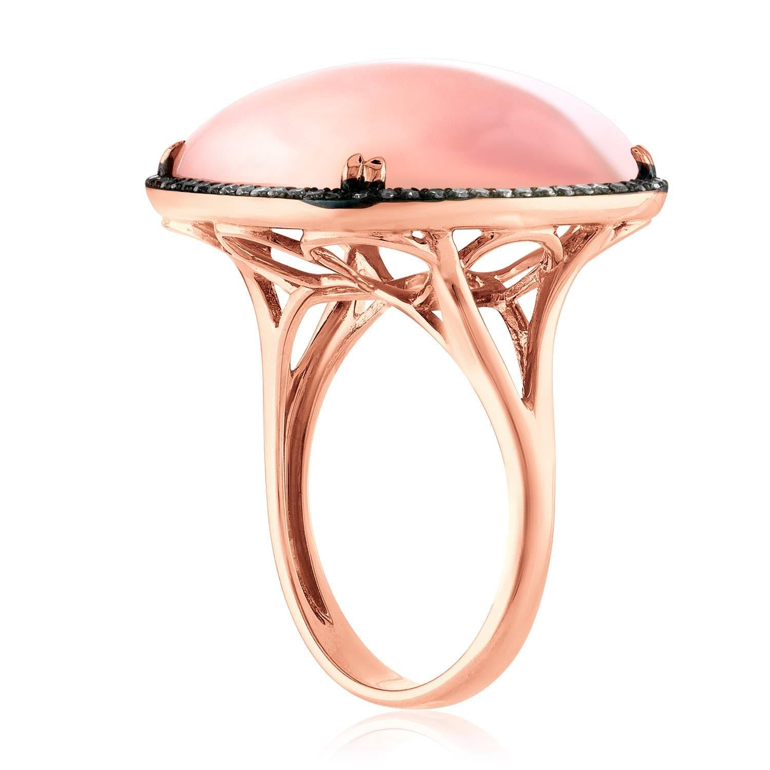 Delicate Statement Ring
The ring is 14K Rose Gold
The ring has a Square Pink Opal 17.0 Carats
There are 0.27 Carats in Brown Diamonds
The ring measures 0.75