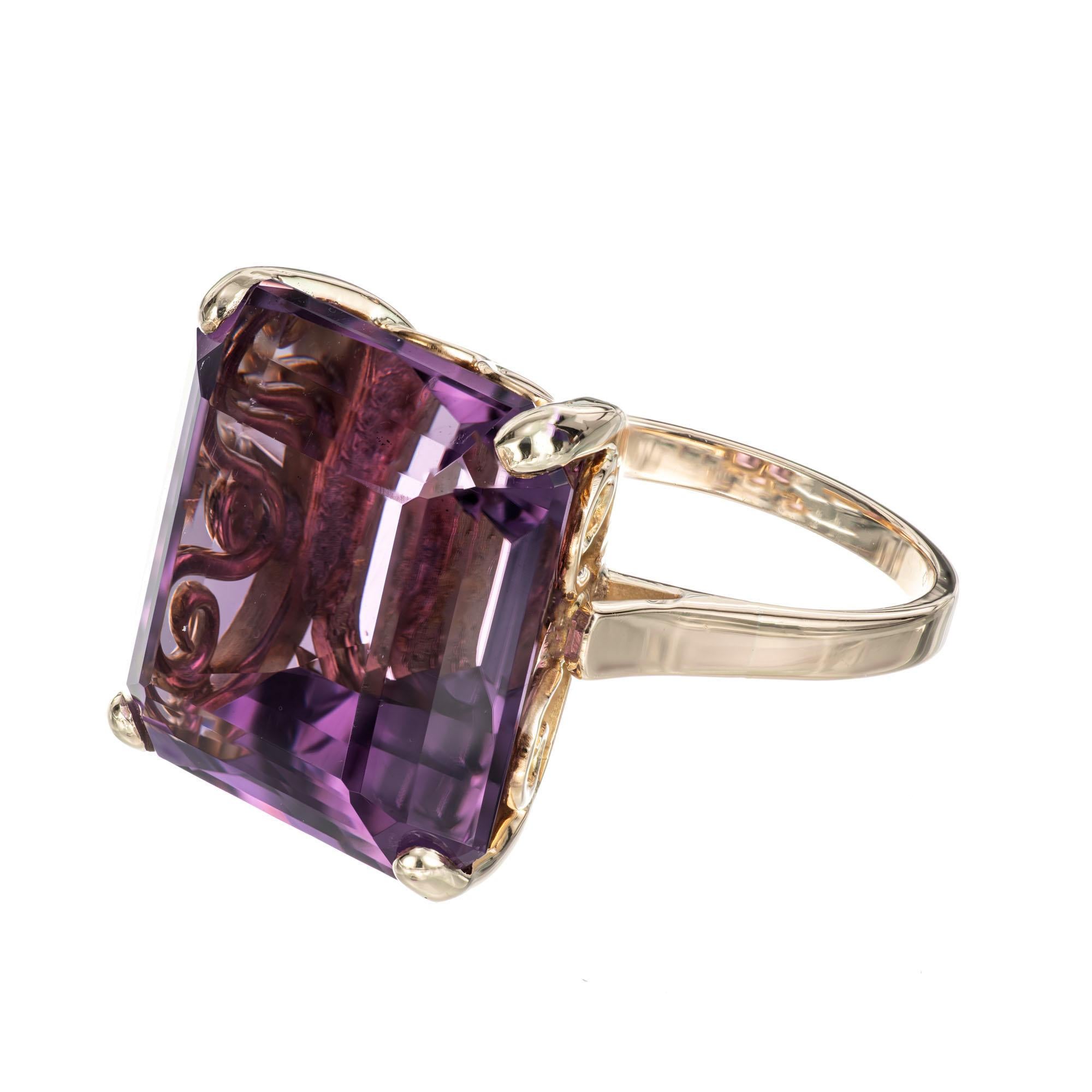 1940's square amethyst cocktail ring. 17.00cts amethyst set in a handmade 18k yellow gold setting. 

1 Well-polished 16.5 x 16mm square bright purple Amethyst, approx. total weight 17.00cts
Size 7 and sizable
18k yellow Gold
9.1 grams
Stamped: