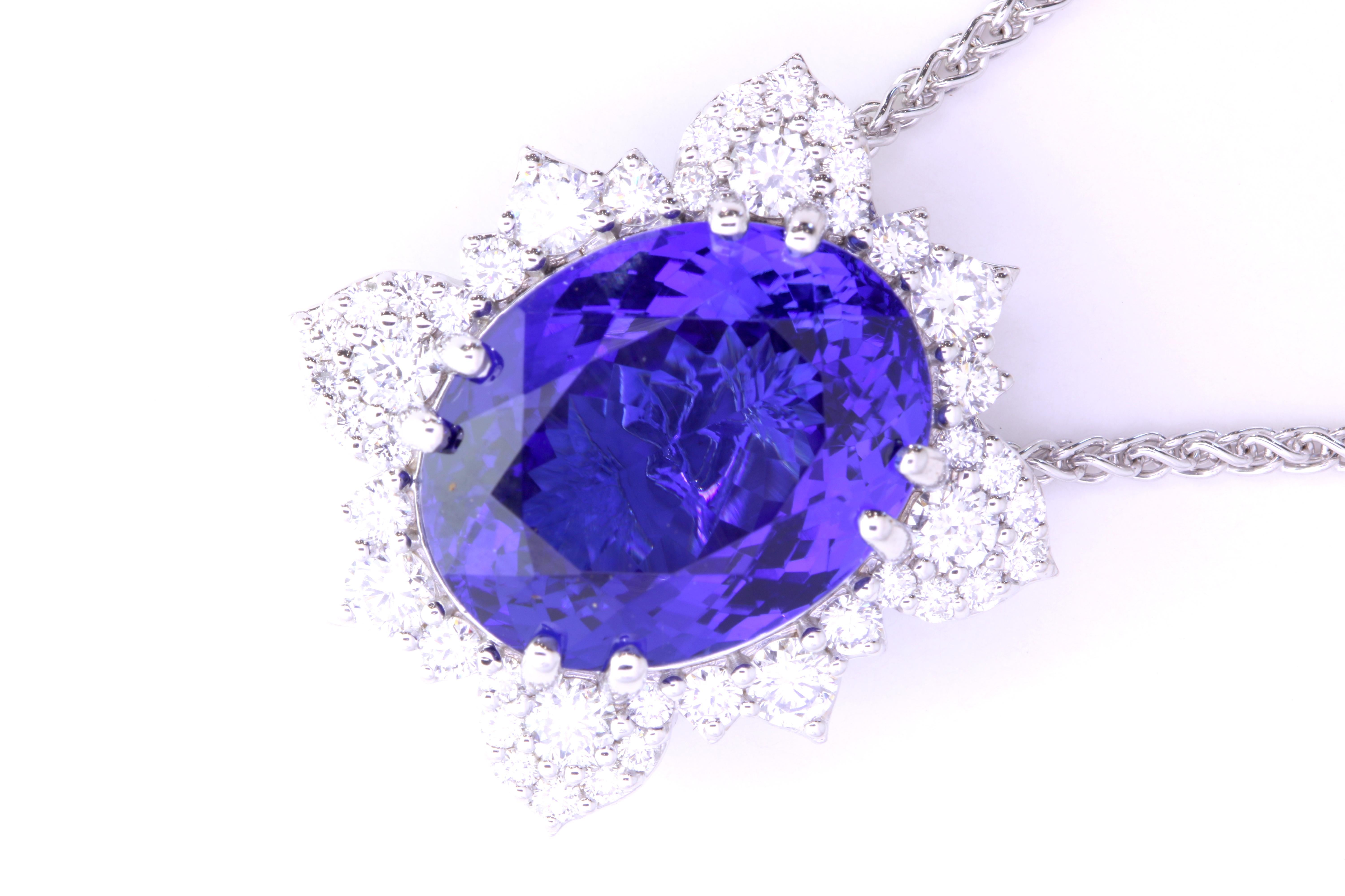 A stunning piece, this 17.02 Carat Oval shaped Tanzanite will draw attention. Surrounded by a burst of 42 brilliant round white diamonds at 1.60 Carats, this statement piece will have all eyes on you. 

Material: 18k White Gold 
Center Stone