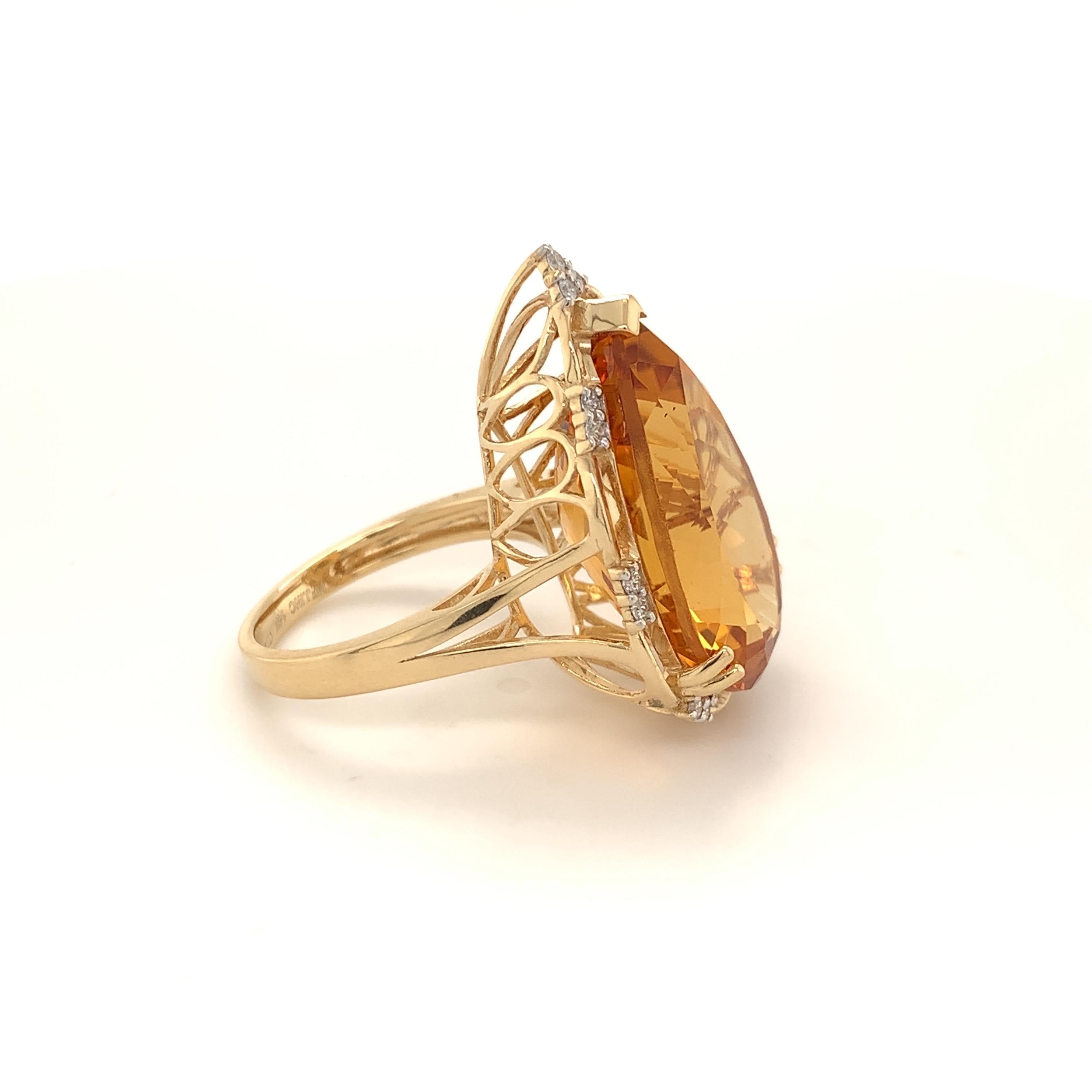 Glamorous ring. High brilliance, rich golden honey tone, transparent clean 17.03 carats natural citrine mounted in high profile open basket with four bead prongs and one knife edge prong, accented with round brilliant cut diamonds. Handcrafted