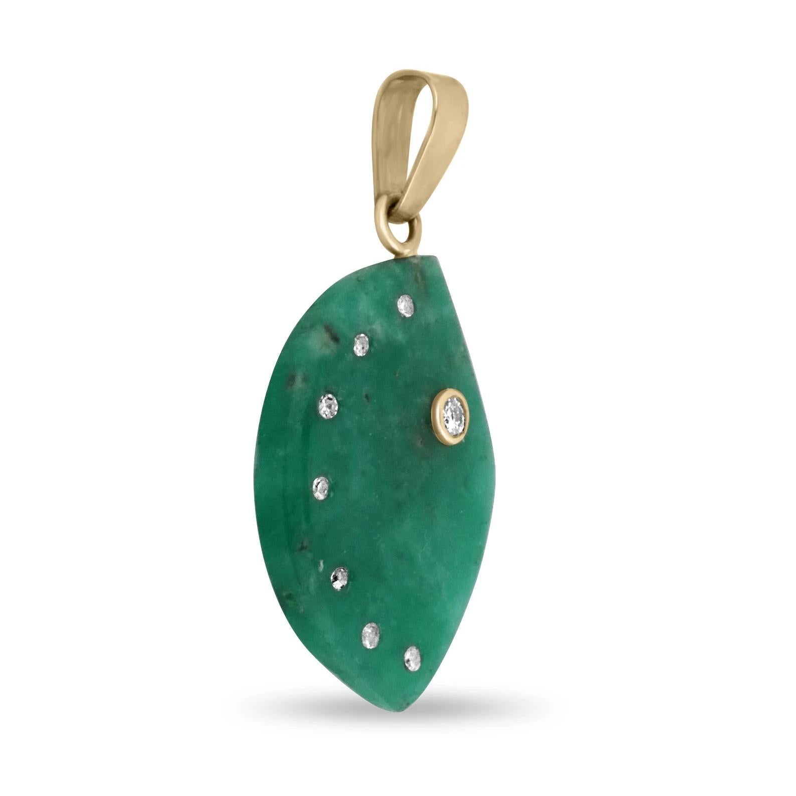 Displayed is our most unique Colombian emerald slice and diamond accents pendant. A natural, emerald slab is encrusted by brilliant round diamonds, accented with a 14k gold bale. The emerald is earth-mined and showcases beautiful medium green color.
