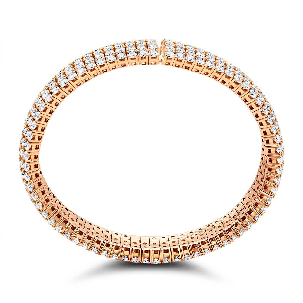 A Dazzling handmade 18k Rose Gold Diamond Bangle Bracelet containing 17.05 Carat round brilliant diamonds. 
VS1\VS2 Clarity FG color.
All the diamonds are handset in prong setting.
54.5 gr solid gold.