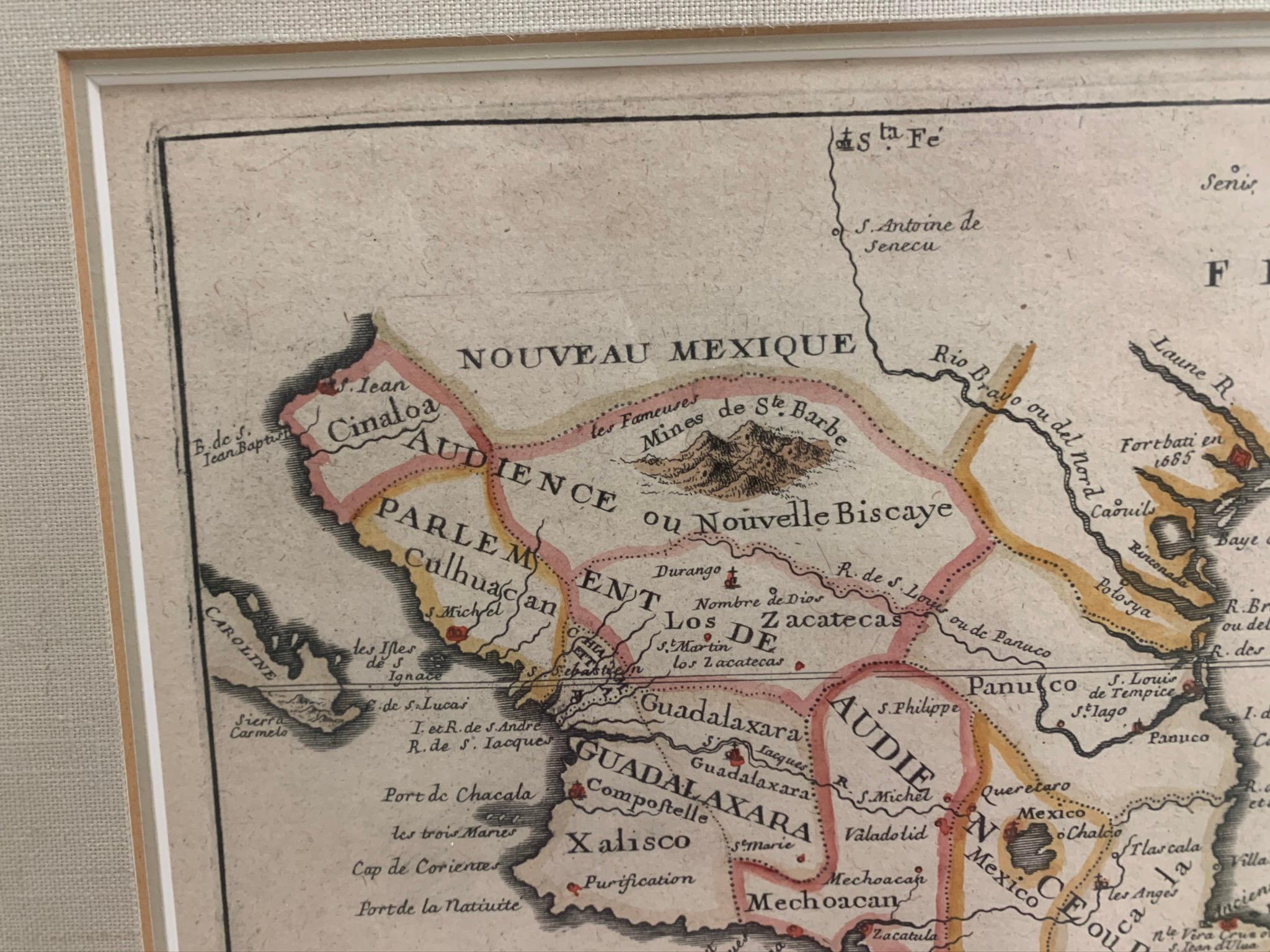 Framed map of Mexico & Florida circa 1705, Paris. Small map with Mexico and the Gulf Coast. Inset text indicating Panama, Acapulco, Mexico City and the Mississippi. Extends North to Santa Fe. Framed in a carved brown wood frame.