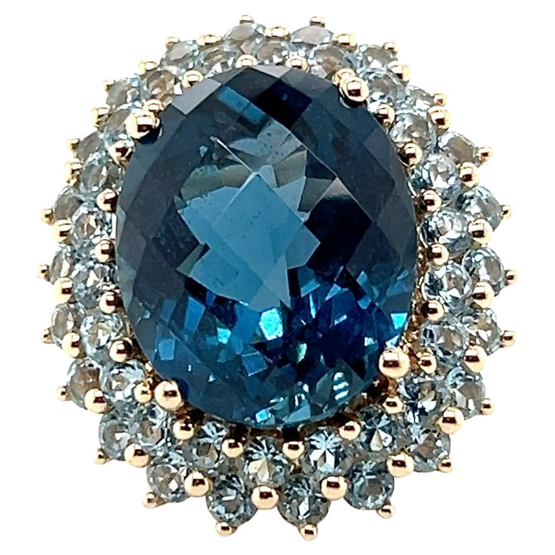 17.07 Carat London Blue Checkerboard Cut Topaz and Yellow Gold Cocktail Ring For Sale