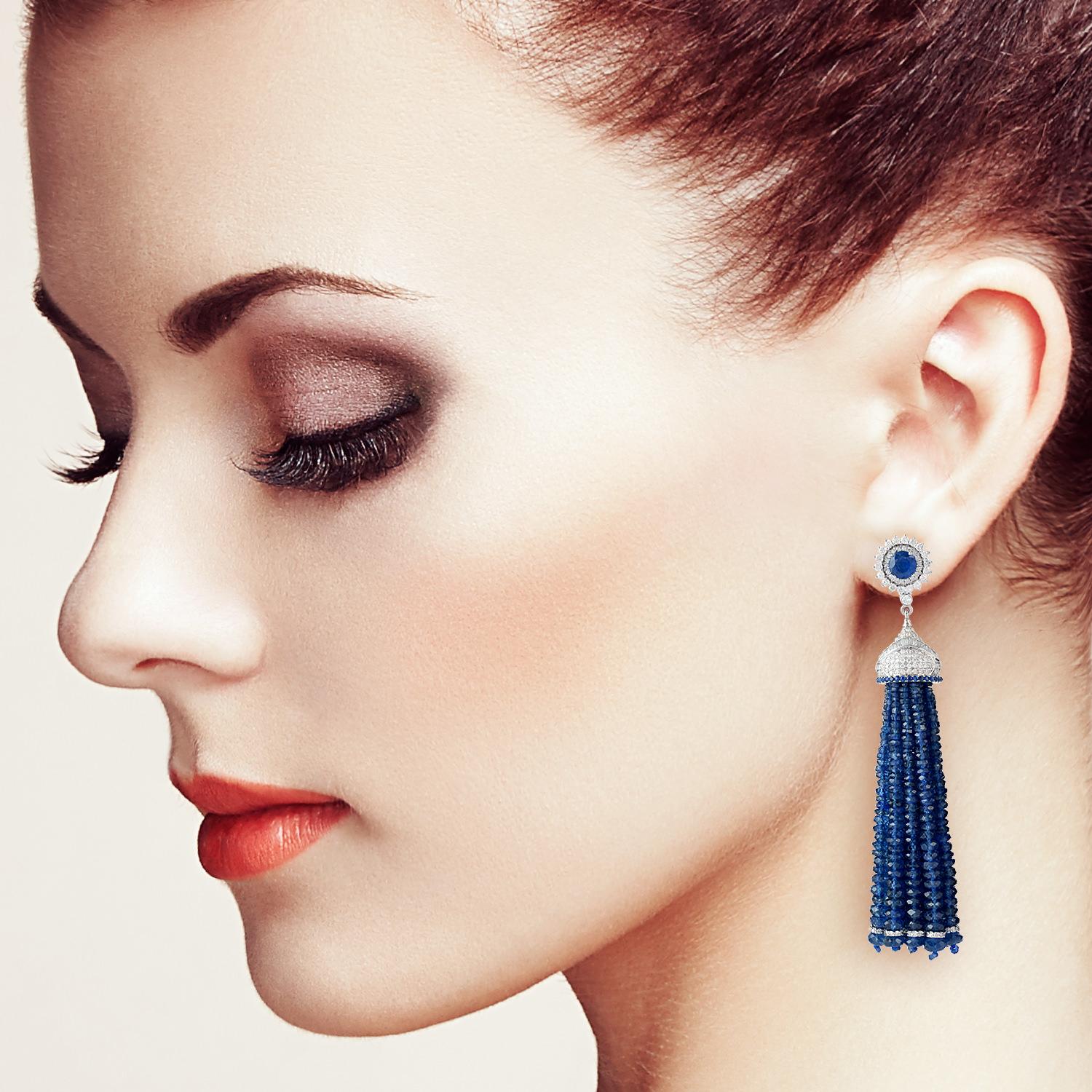 These stunning tassel earrings are handmade in 18-karat gold.  It is set with 170.84 carats blue sapphire and 3.94 carats of glittering diamonds.

FOLLOW  MEGHNA JEWELS storefront to view the latest collection & exclusive pieces.  Meghna Jewels is