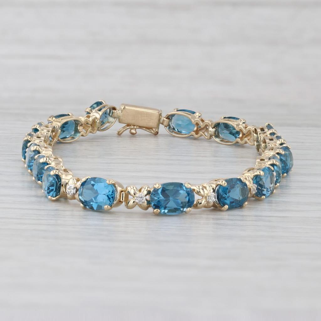 da uomo o donna Bracciale tennis con topazio blu di Londra da 17,09 ct. in oro giallo 14 ct. con accenti di diamanti da 7