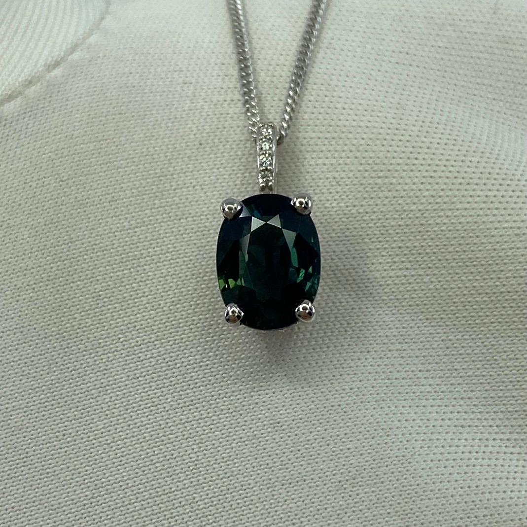 Women's or Men's 1.70ct Deep Green Blue Sapphire Oval 18k Gold Diamond Surround Pendant Necklace For Sale