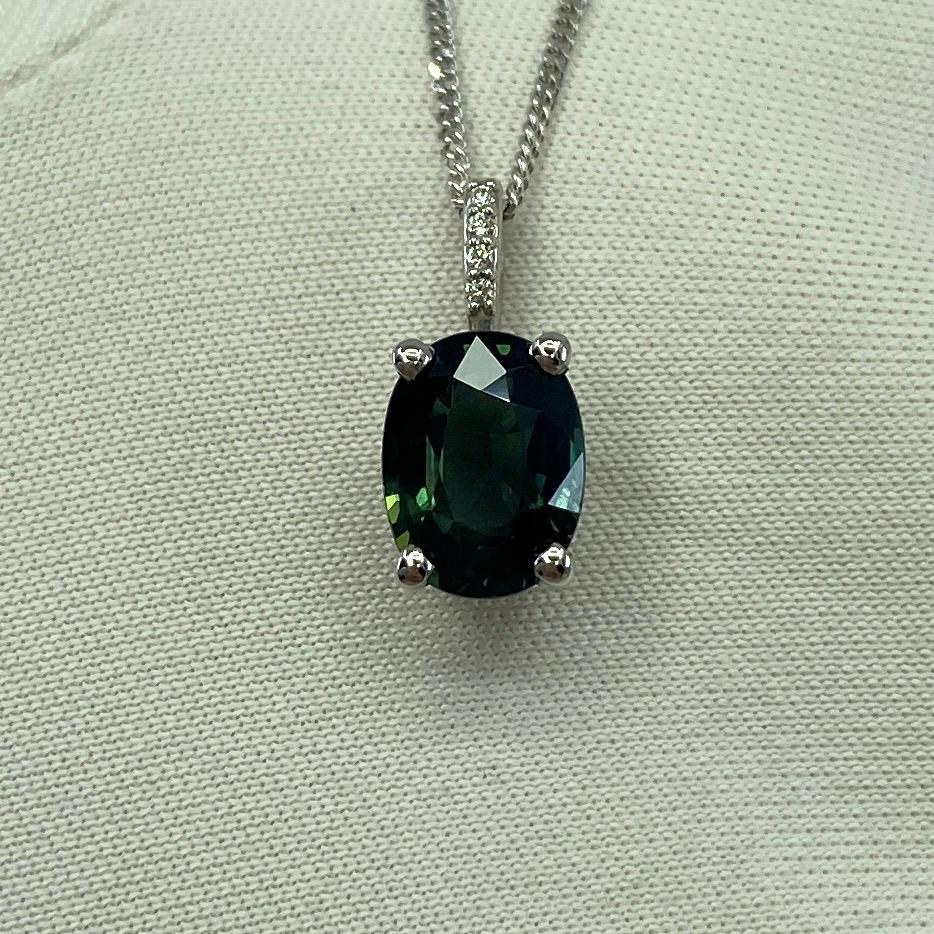 1.70ct Deep Green Blue Sapphire Oval 18k Gold Diamond Surround Pendant Necklace For Sale 2