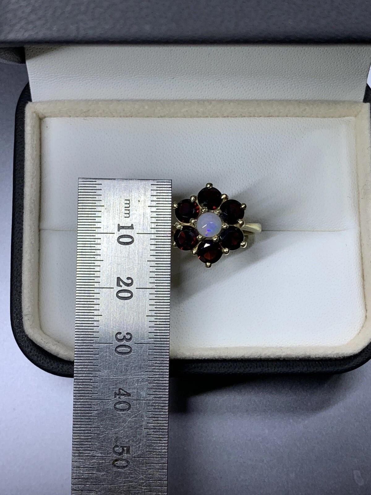 Round Cut 1.70ct Garnet opal engagement ring in 9ct yellow gold. For Sale