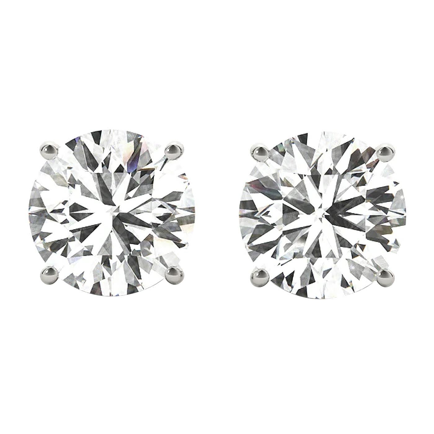 Captivate her with the stunning and dazzling look of these 4 prong basket-setting natural diamond earrings. Beautifully crafted in Platinum, these gorgeous diamond earrings feature 1.70ct (0.85 Carat each) round cut diamonds on each Earring, with G