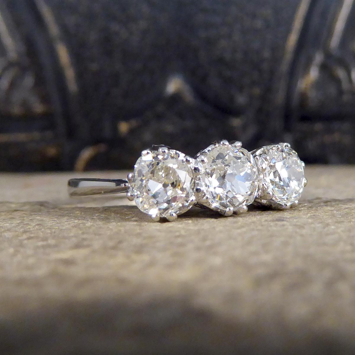 An absolutely gorgeous and sparkly Diamond three stone ring holding three Old Cut Diamonds set in a secure Platinum double claw setting. With a total of 1.70ct Diamonds and a beautifully detailed gallery this ring would such a lovely gift and can be
