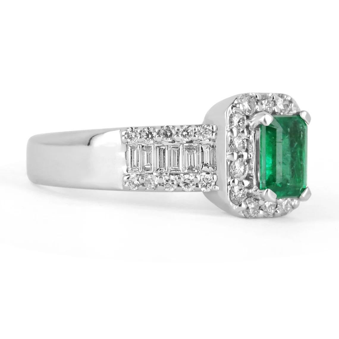 Elegance and sophistication are what this gorgeous emerald and diamond ring is all about. The emerald is a full 0.70-carats, accented by brilliant round diamonds creating a gorgeous halo around the center stone. The shank includes round and baguette