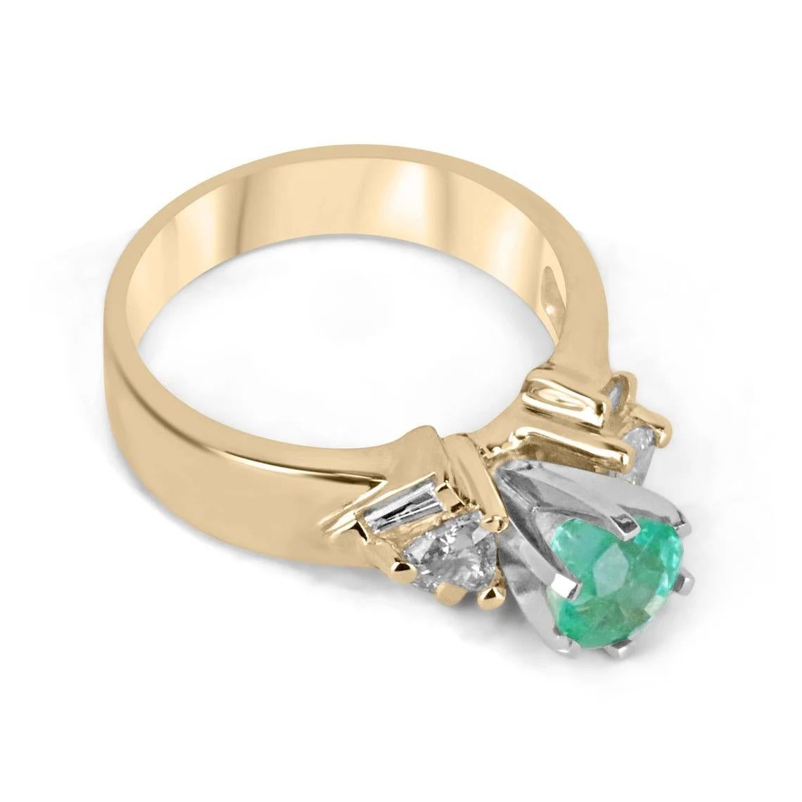 Celebrate your eternal love with this exquisite emerald and diamond engagement ring. The centerpiece of this stunning piece is a mesmerizing 1.15-carat round cut natural emerald, boasting amazing clarity, luster, and a vivid spring green color that